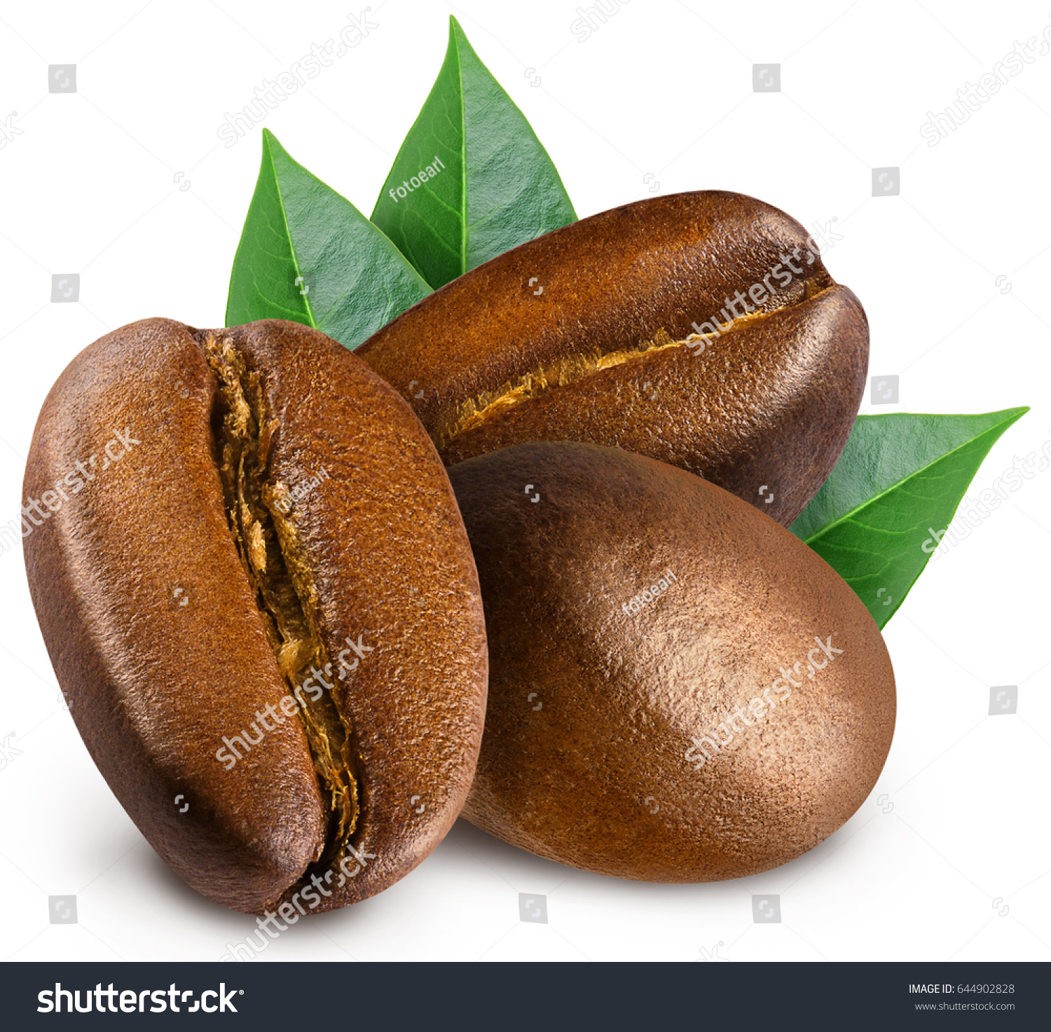 Three shiny fresh roasted coffee beans with leaves isolated on white background. #644902828