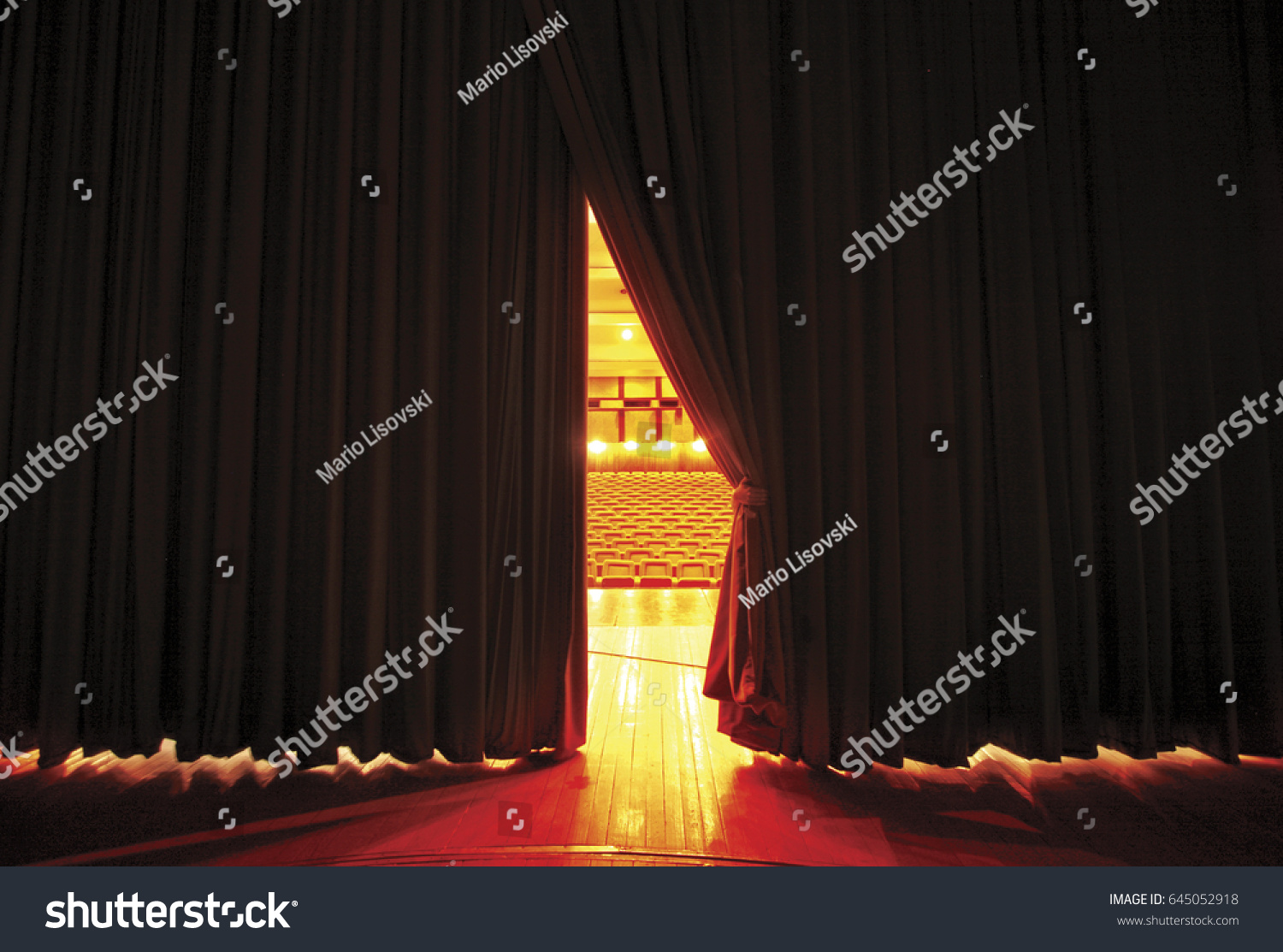Theater seats through curtains.. behind scene #645052918