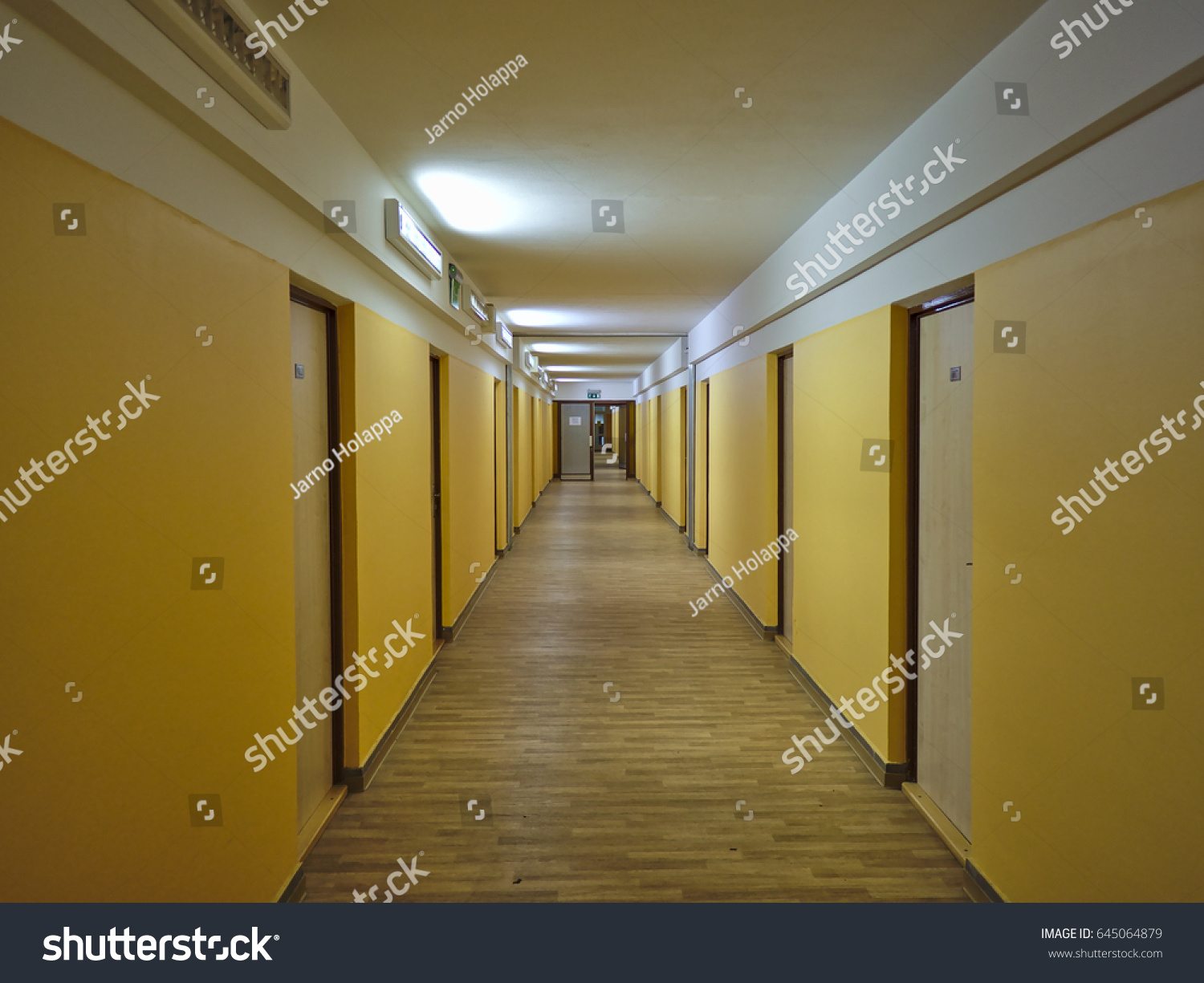Long empty dormitory corridor with vintage style. #645064879
