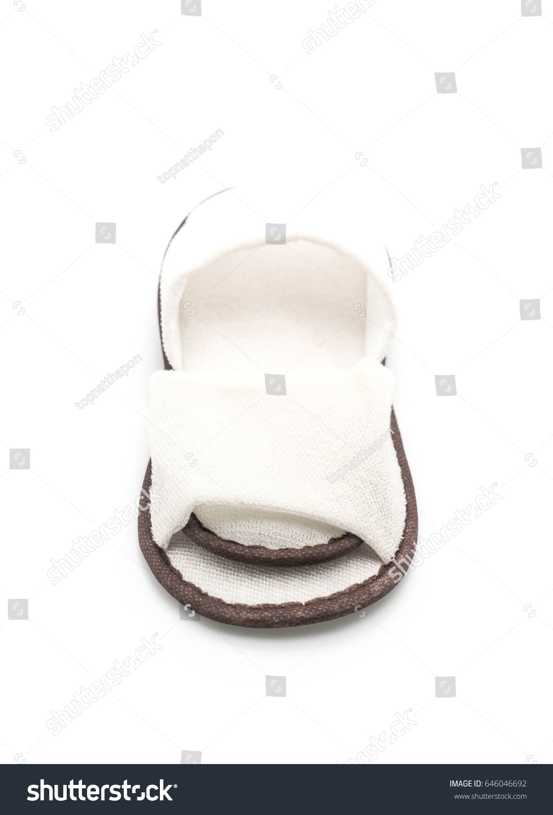 white slippers on white background #646046692