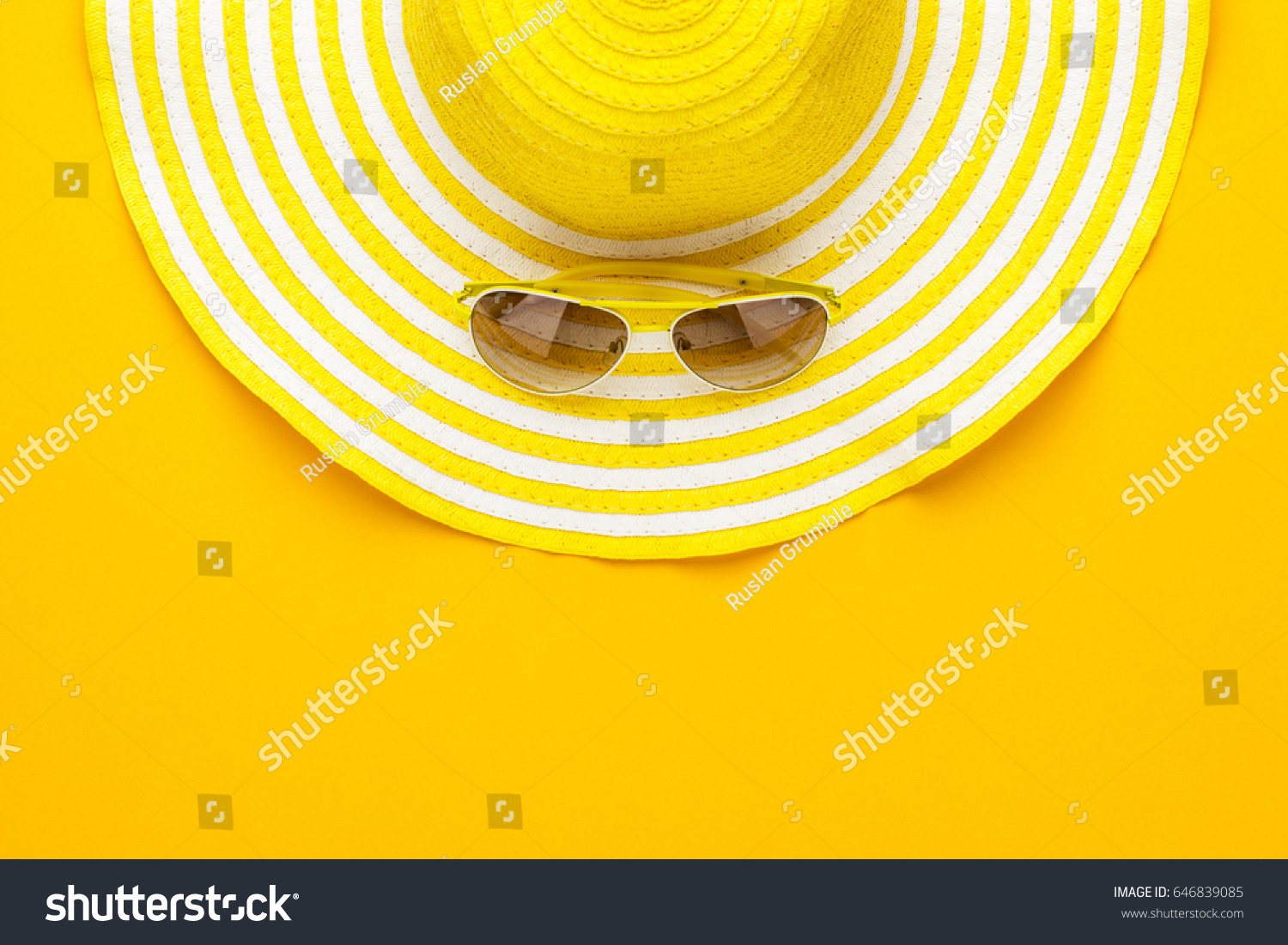 yellow sunglasses and striped retro hat. summer concept #646839085
