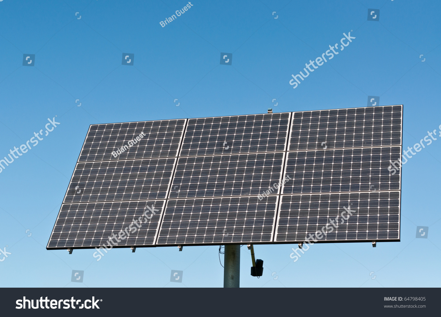 A photovoltaic solar panel array in a park with - Royalty Free Stock ...