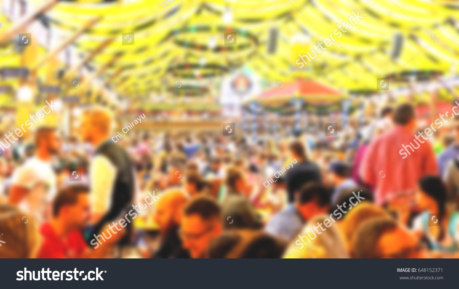 Blur_People enjoy live music and drinking beer during October festival in munich (München), Germany #648152371