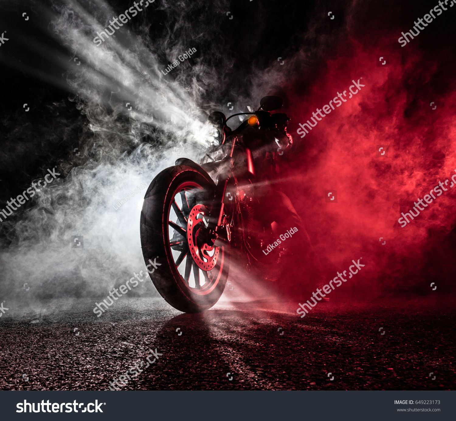 High power motorcycle chopper at night. Smoke on background. #649223173
