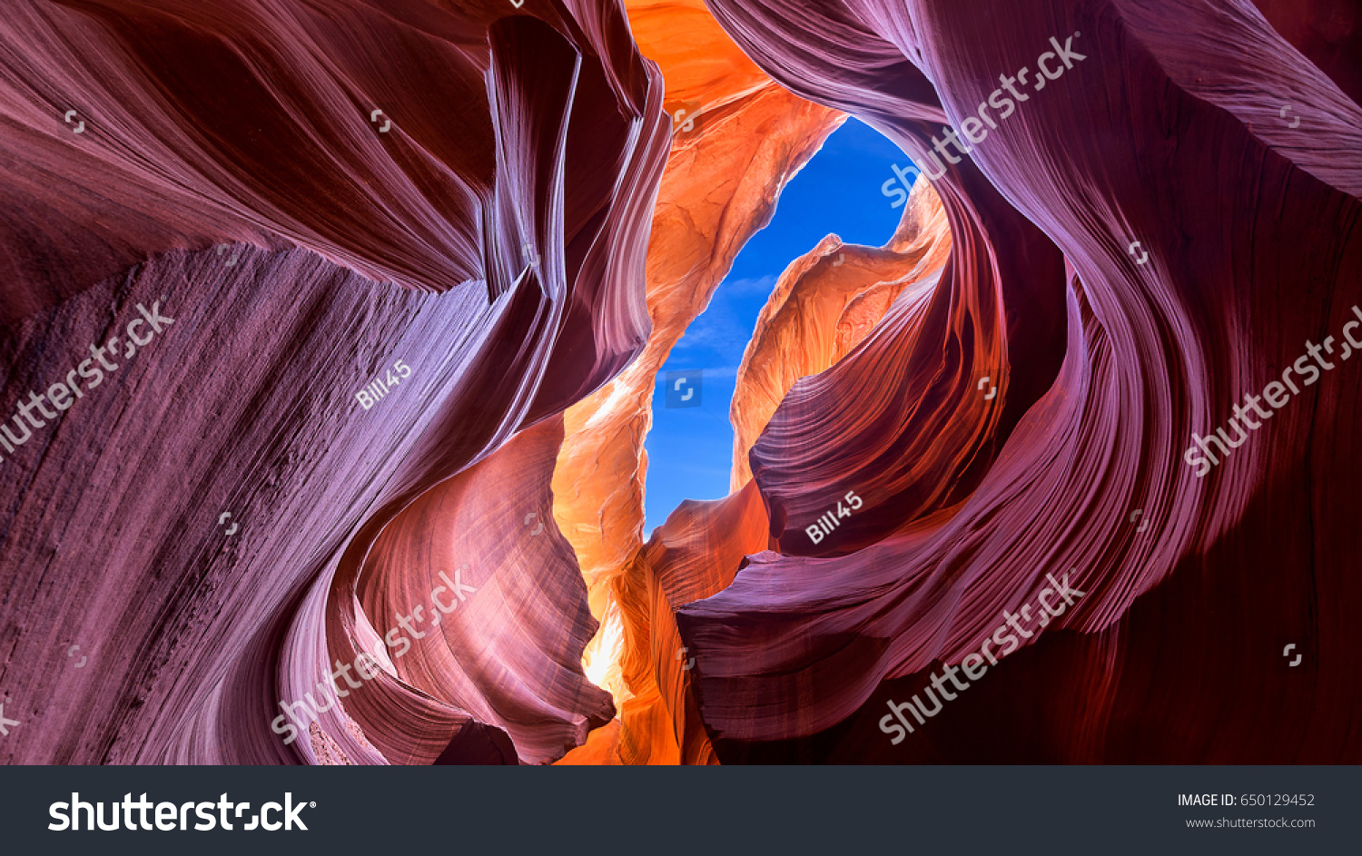 Beautiful wide angle view of amazing sandstone formations in famous Lower Antelope Canyon near the historic town of Page at Lake Powell, American Southwest, Arizona, USA #650129452