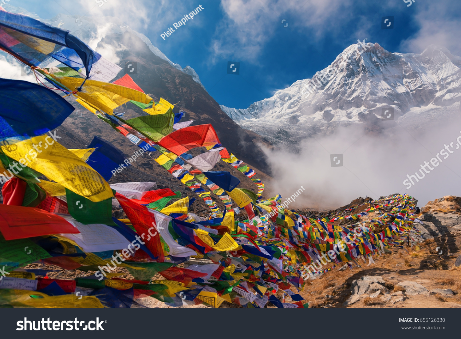 Prayer flags and Mt. Annapurna I background from Annapurna Base Camp ,Nepal. #655126330