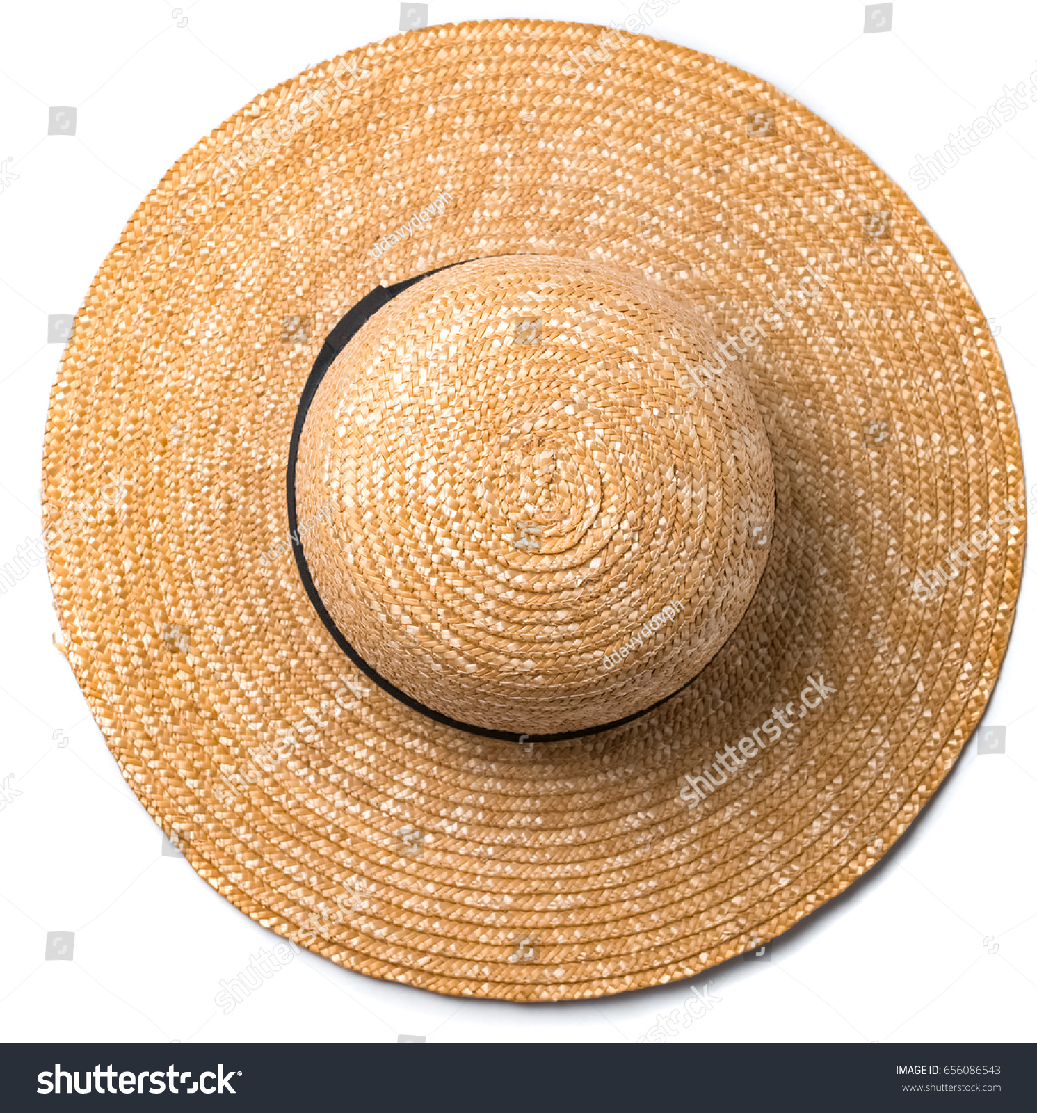 Pretty beautiful straw hat with ribbon and bow on white background beach hat from a side view isolated #656086543