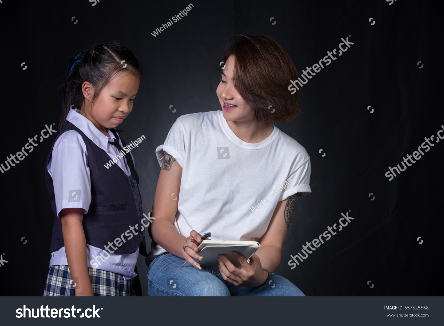 Asian Teenage Girl Short Hair Wearing A Stock Photo 657525568