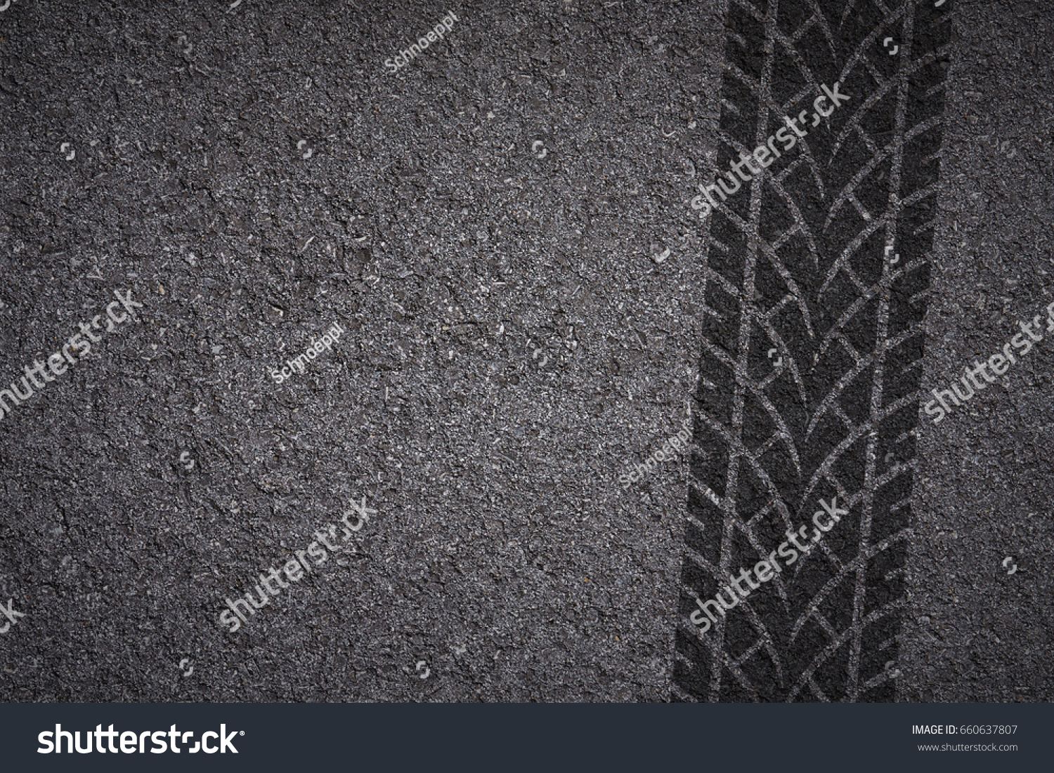 tire tread pattern on asphalt background #660637807