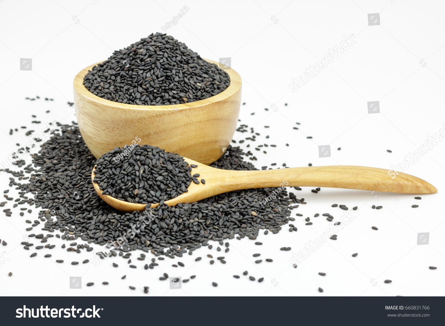 Black Sesame Seeds  in wooden bowl and spoon on white background. Composition isolated over the white background. #660831766