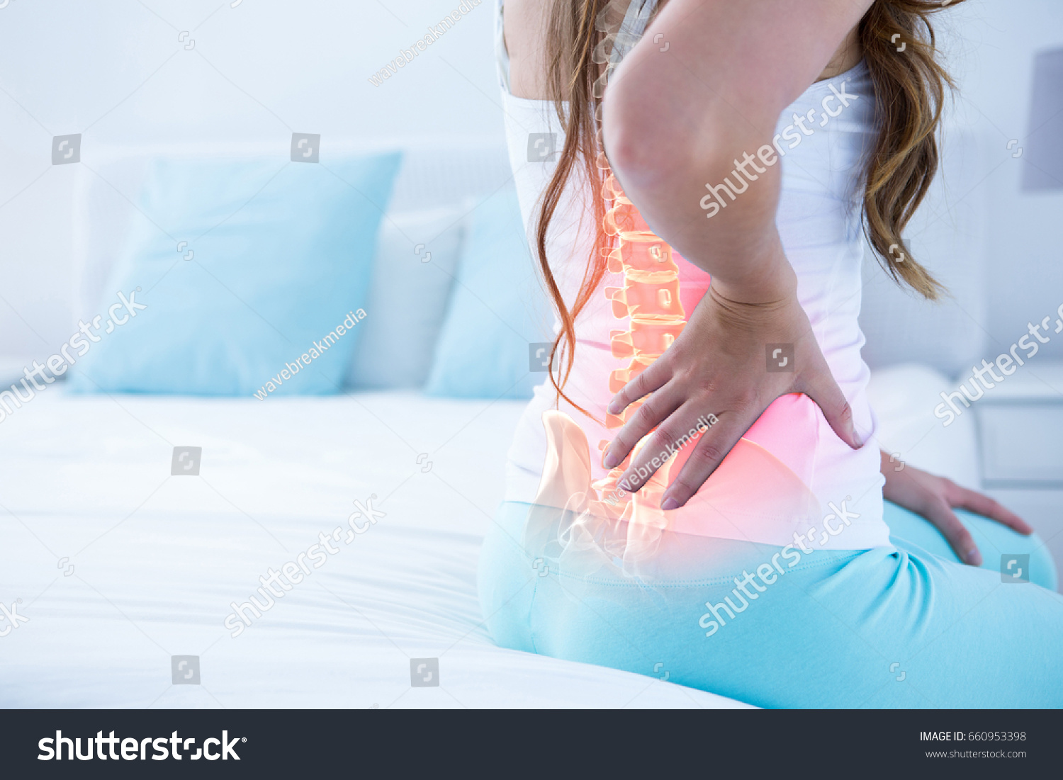 Digital composite of highlighted spine of woman with back pain at home #660953398