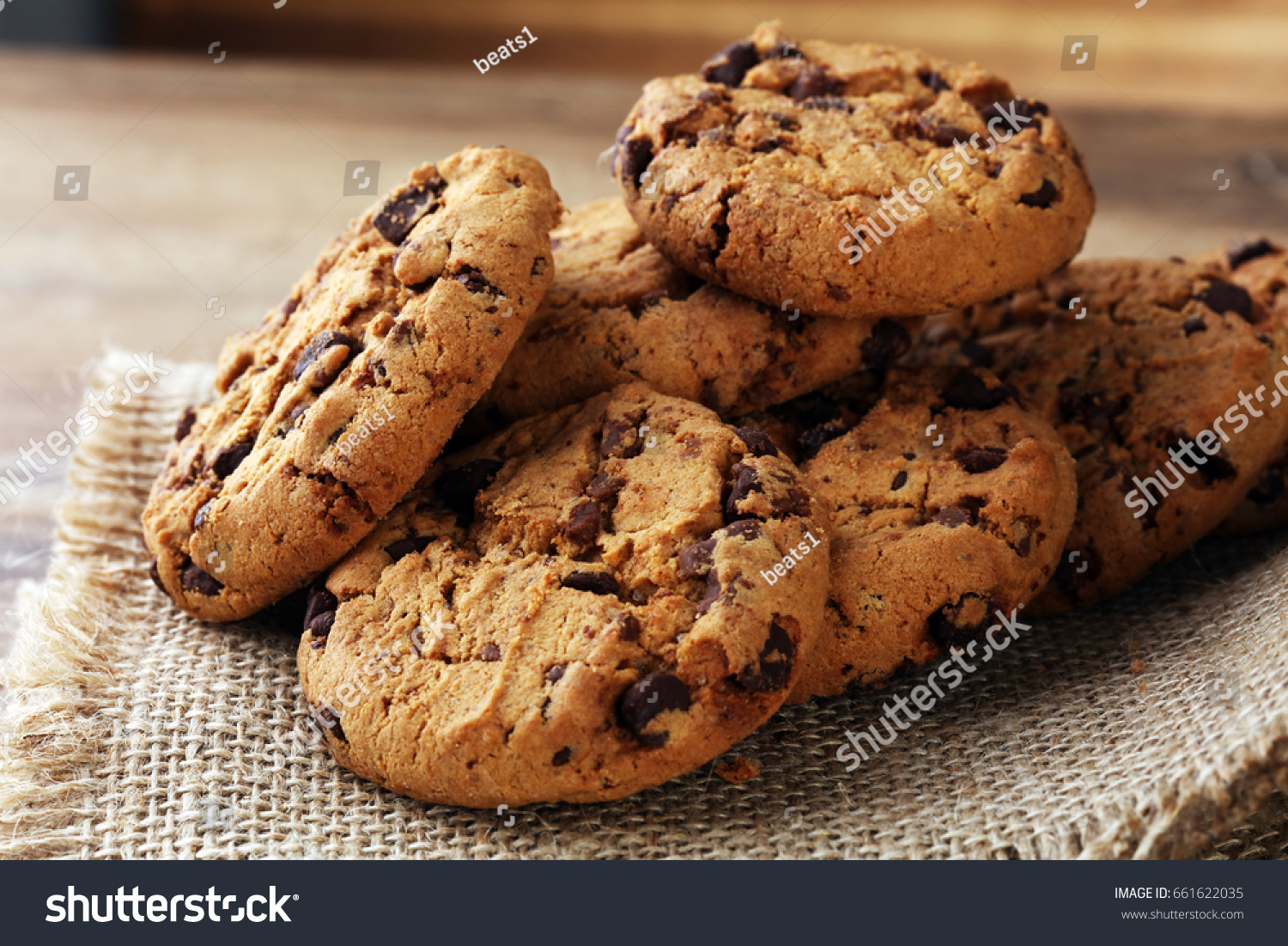 Chocolate cookies on wooden table.   #661622035
