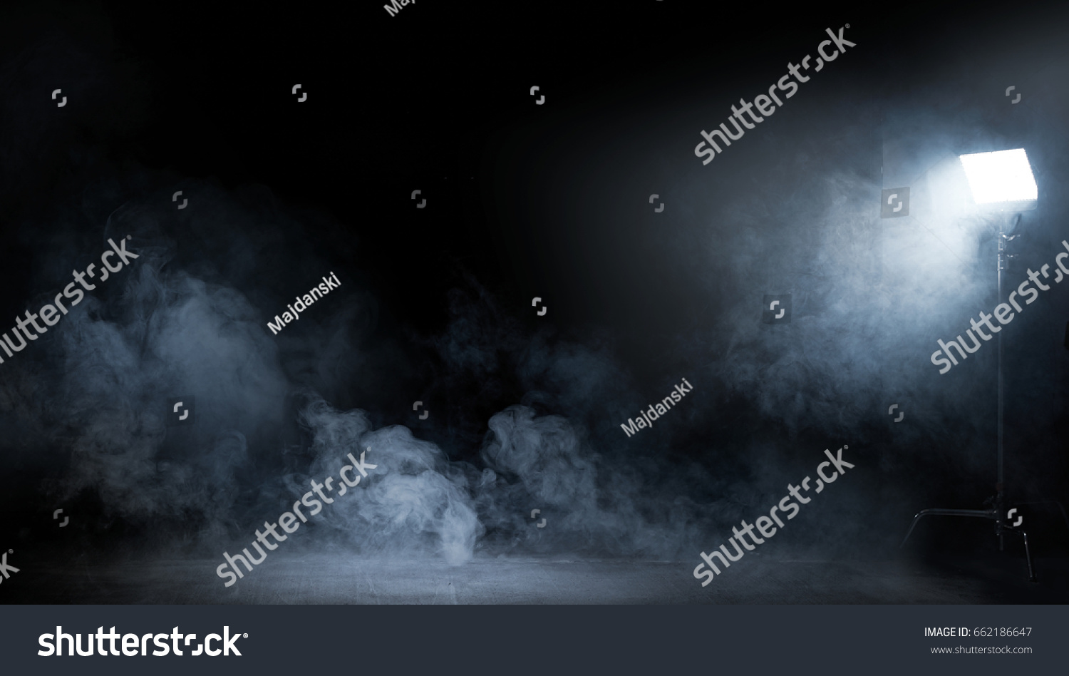 Conceptual image of a dark interior full of swirling fume #662186647