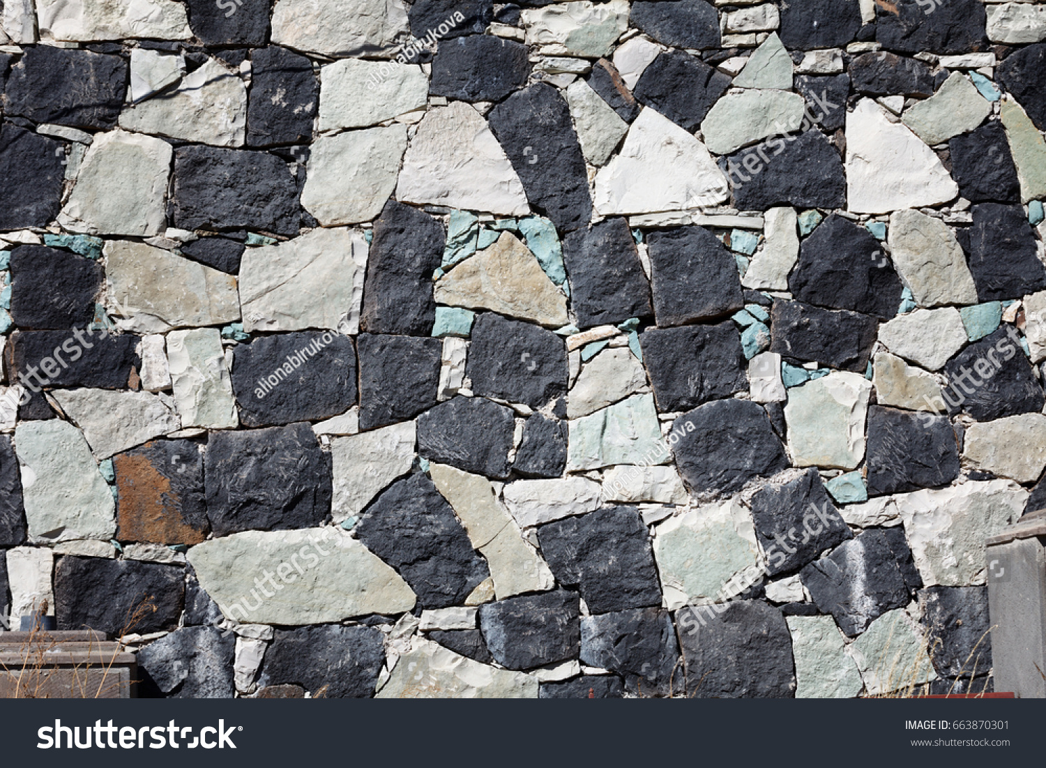 Wall stone texture of an old Sevanavank church in Sevan, Armenia #663870301