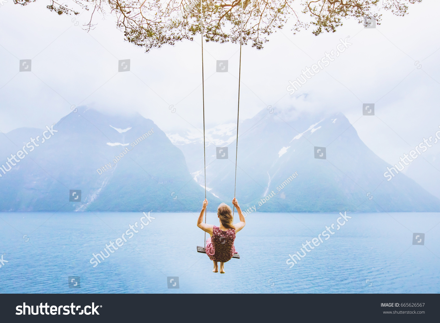 dream concept, beautiful young woman on the swing in fjord Norway, inspiring landscape #665626567