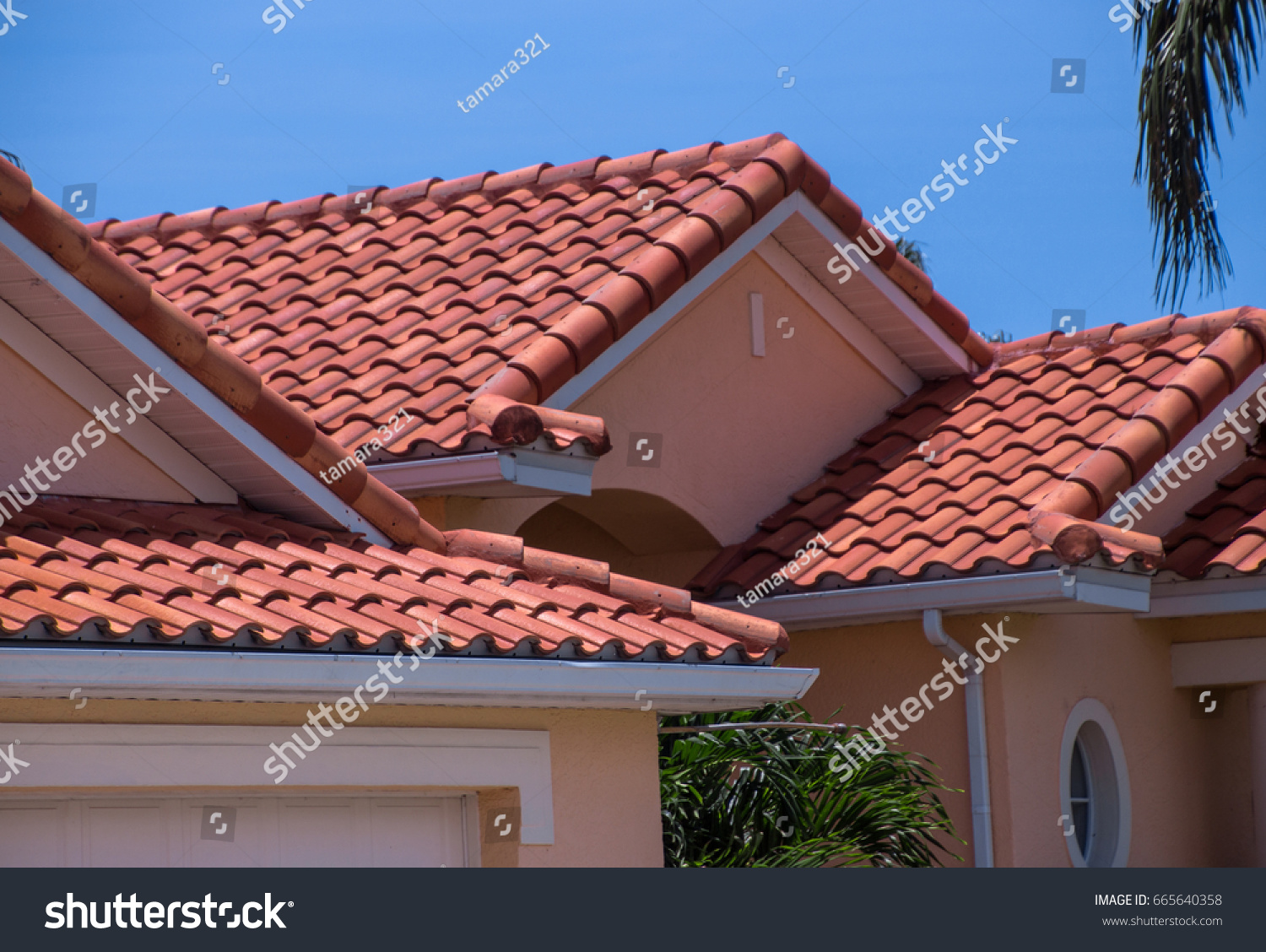 Florida home with spanish tiled roof #665640358