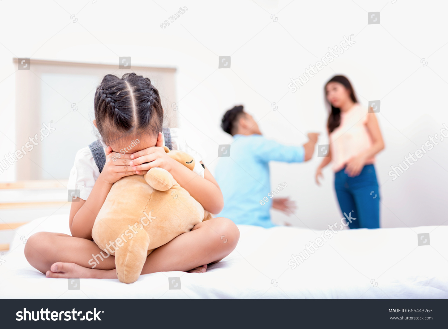 Frustrated of little girl is disaster in argument of mother and father in family conflict,Family concept. #666443263