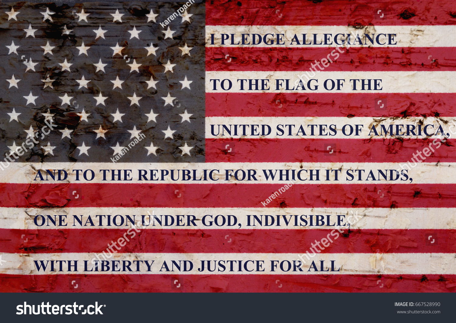 The pledge of allegiance written on a weathered United States of America flag #667528990