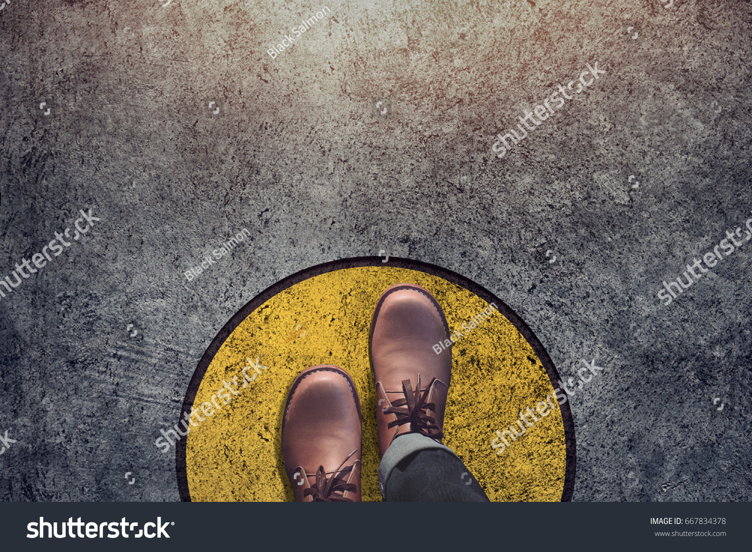 Comfort Zone concept, Male with leather shoes steps over circle line to outside bound, Top view and Dark tone, Grunge Dirty Concrete Floor as Background
 #667834378