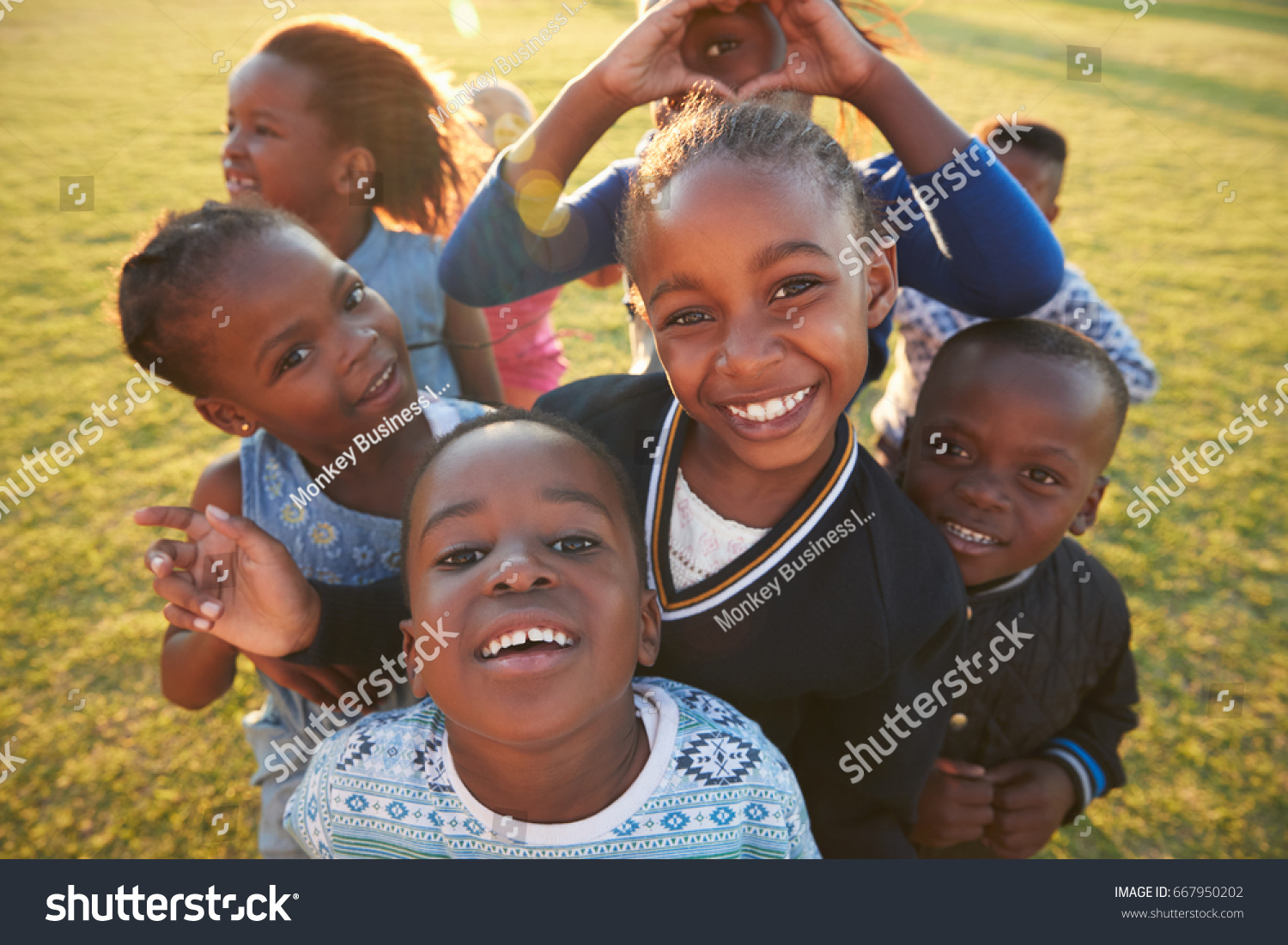 Elementary school kids having fun outdoors, high angle #667950202