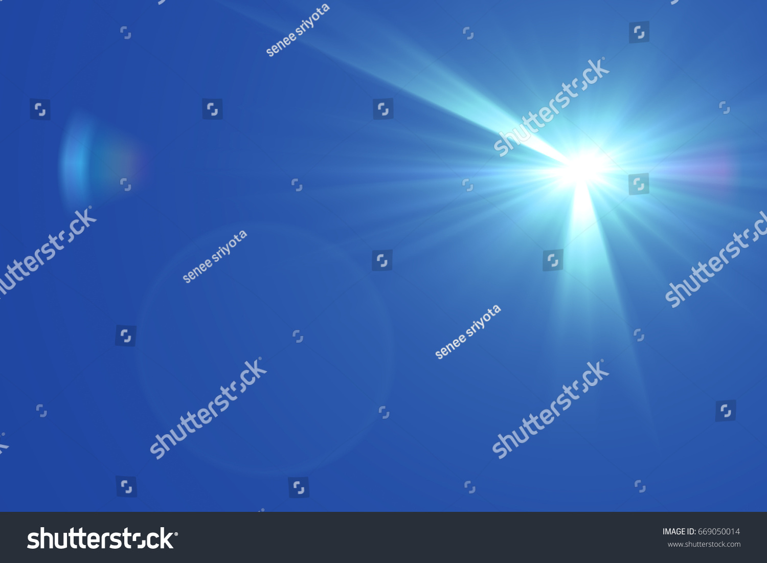 sun light with  flare on blue sky background #669050014