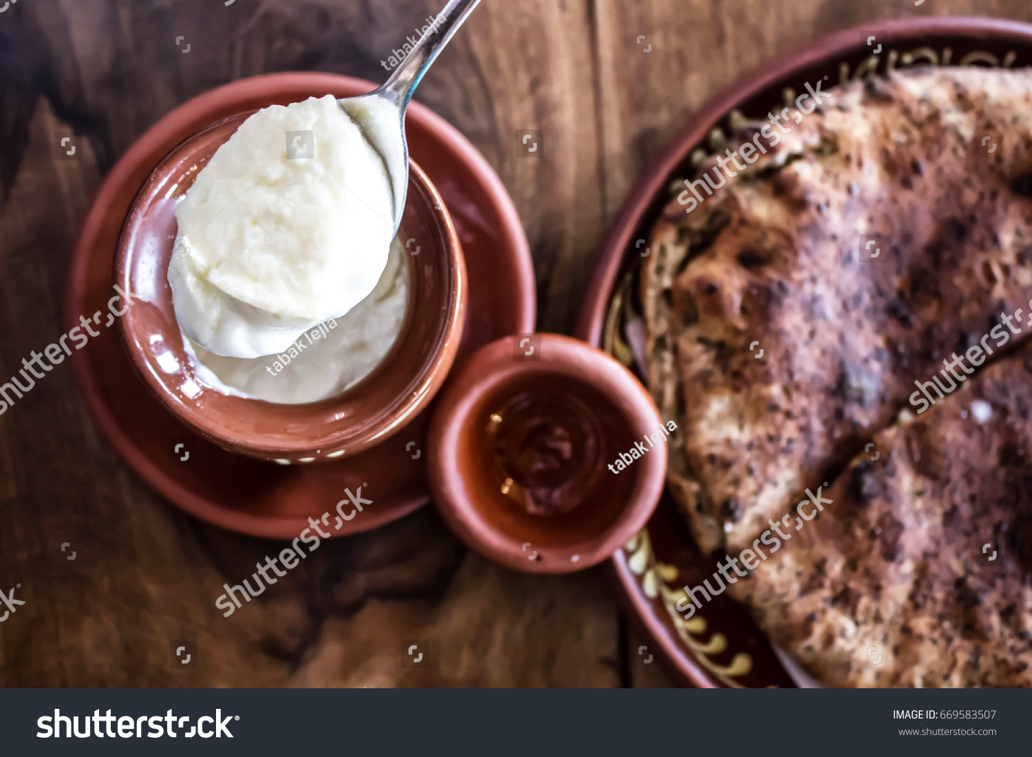 Traditional Bosnian breakfast, buckwheat, homemade bread, homemade yogurt, homemade cheese #669583507