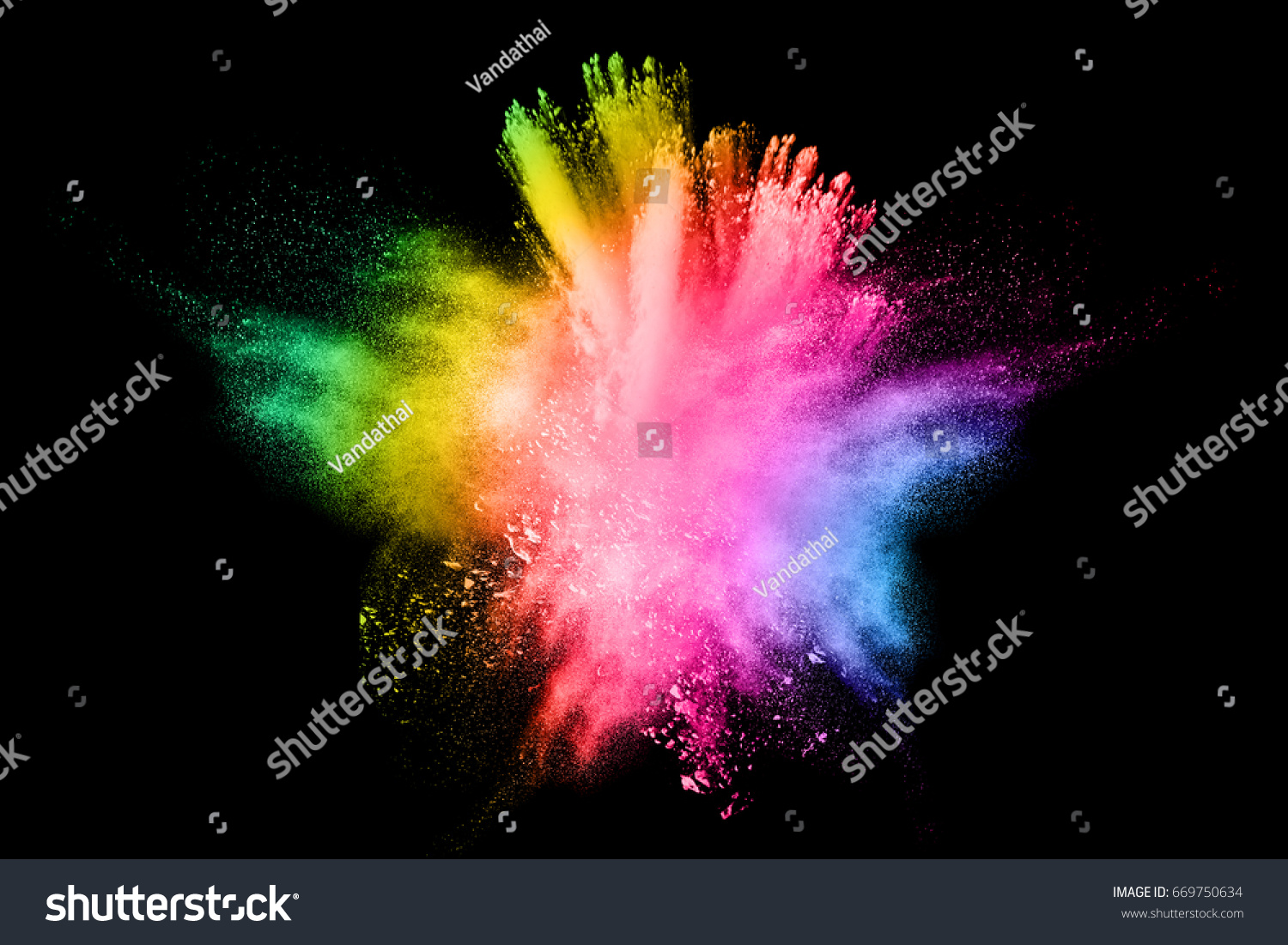 Abstract multi colored powder explosion on white background.. Closeup of  colorful dust particles splattered isolated on white  background. #669750634
