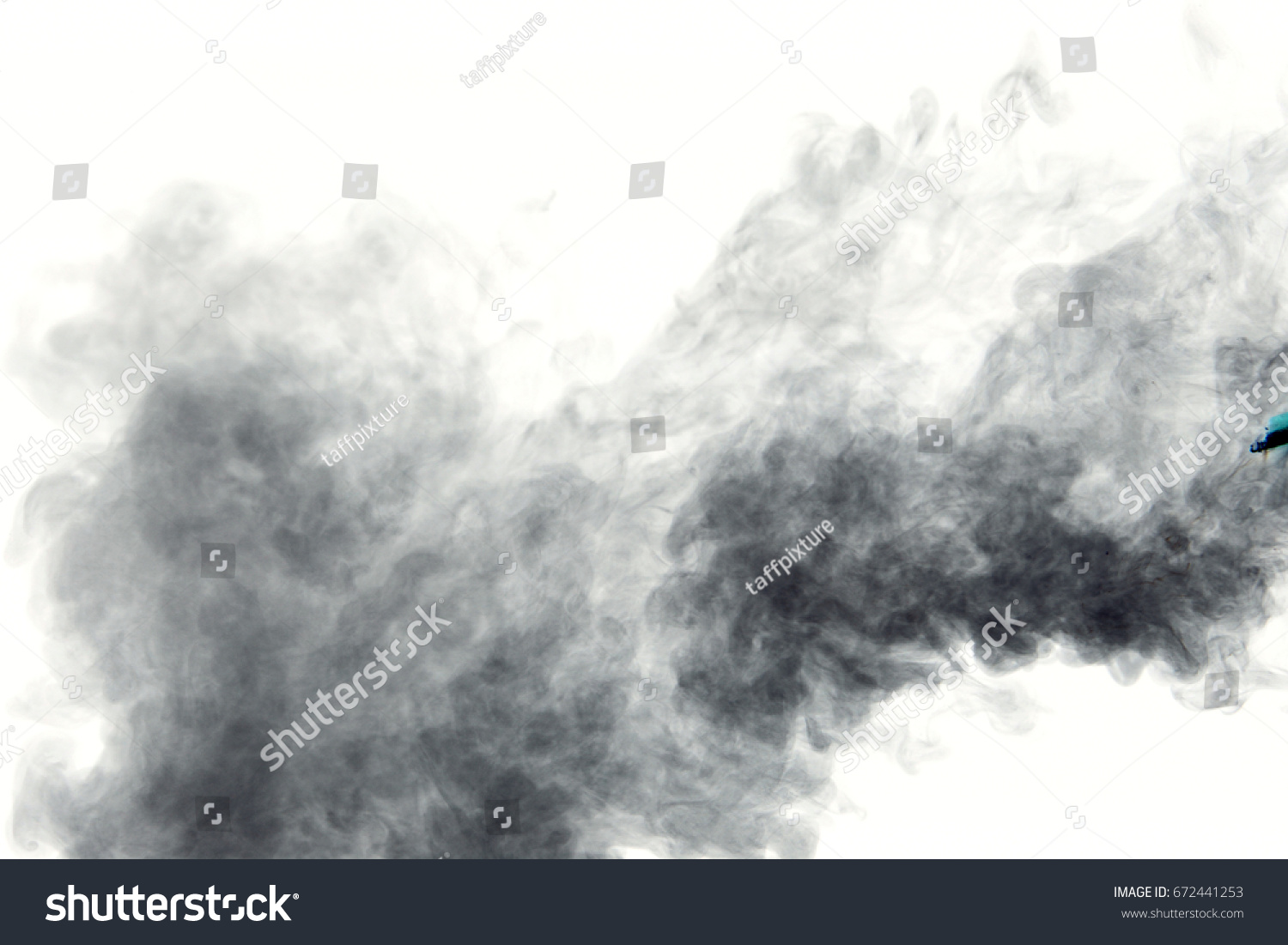 Smoke background / Smoke is a collection of airborne solid and liquid particulates and gases emitted when a material undergoes combustion #672441253