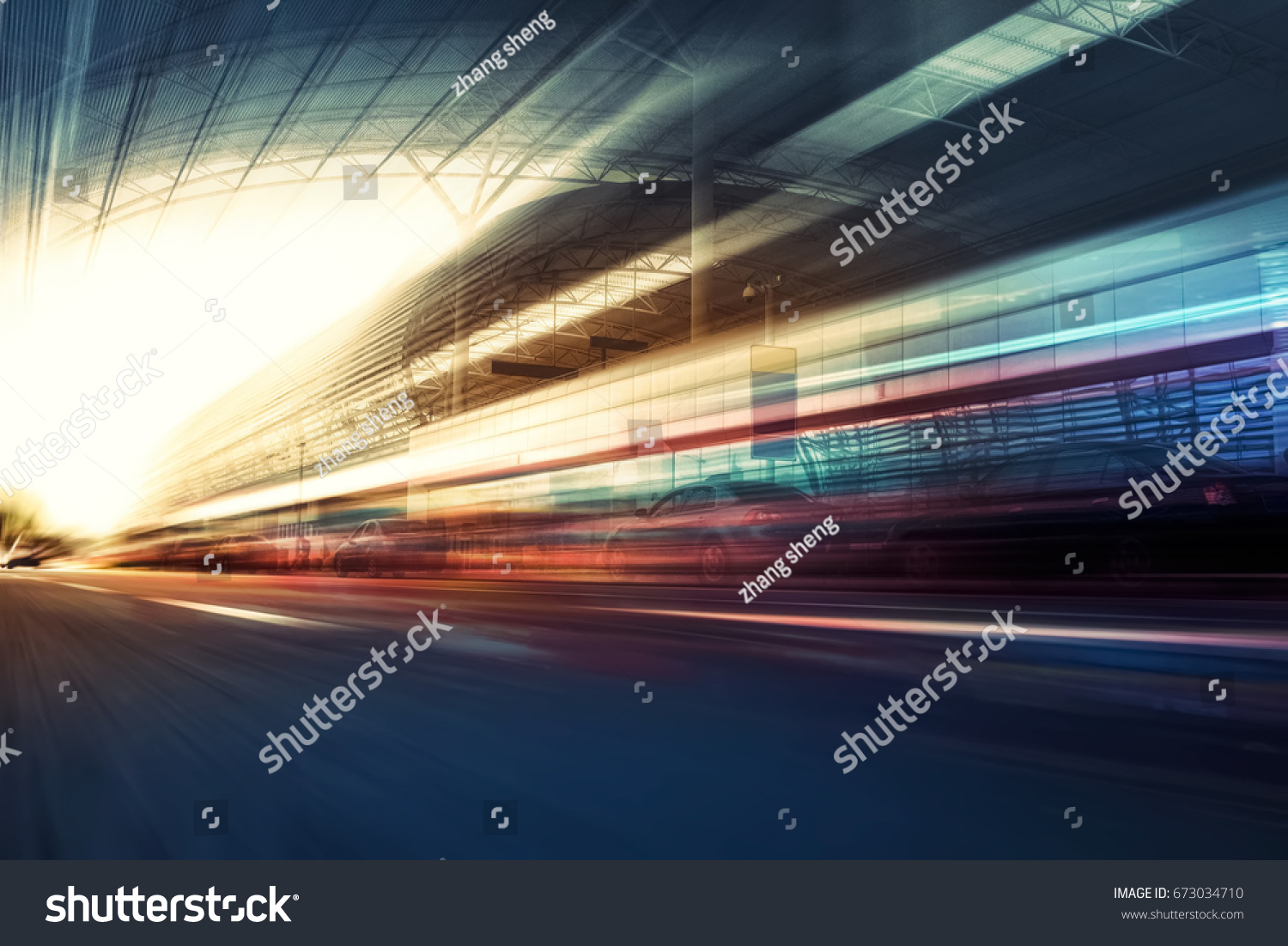 Blurry chromatic color tunnel car traffic motion blur. Motion blur  the speed and dynamics. #673034710
