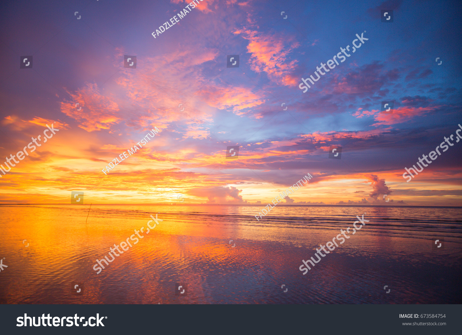 extreme color of sunset at one of the beach of north Borneo #673584754