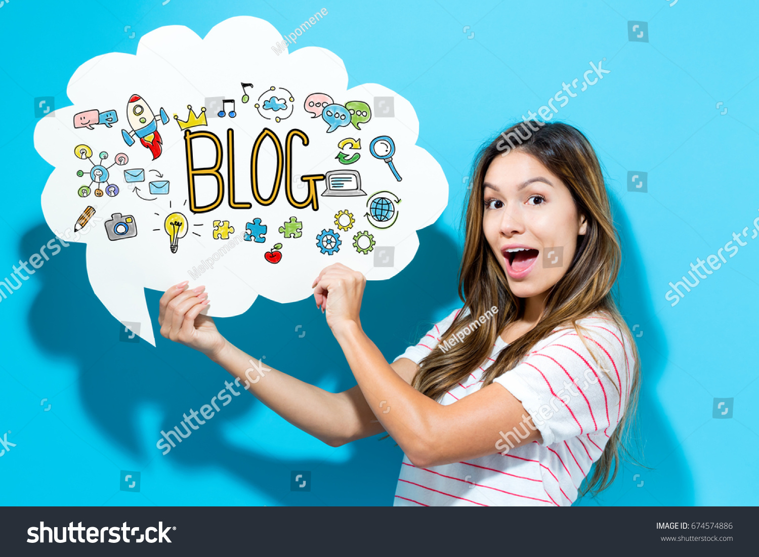 Blog text with young woman holding a speech bubble on a blue background #674574886