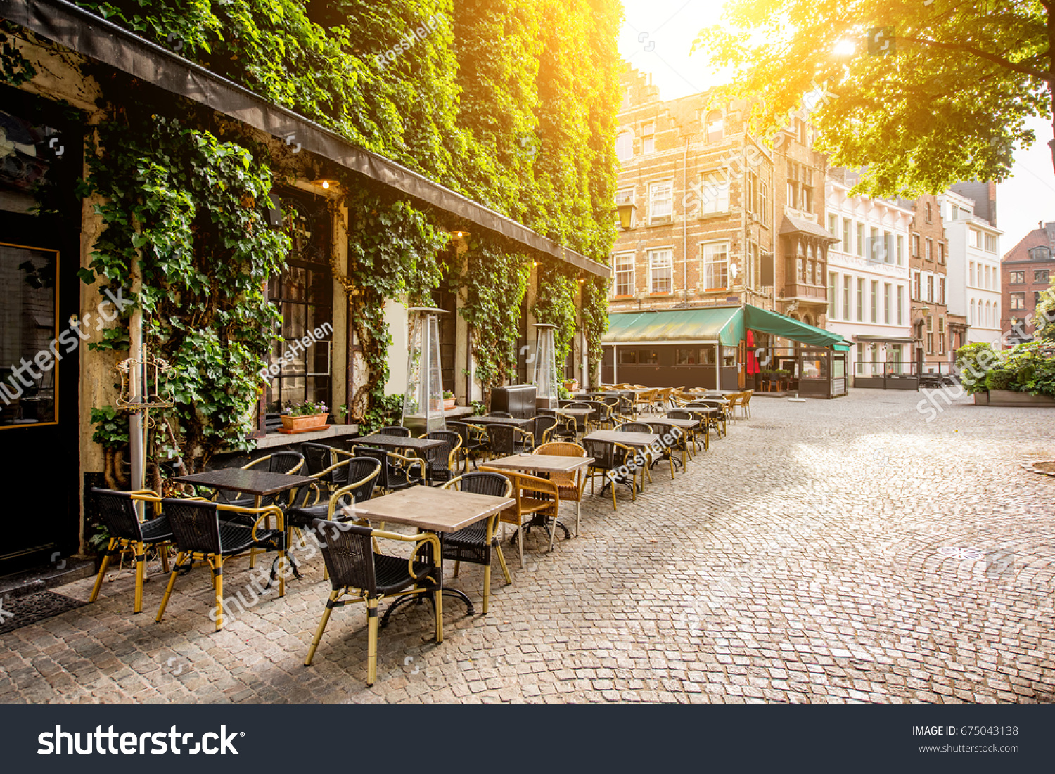 Street view with cafe terrace during the morning in Antwerpen city in Belgium #675043138