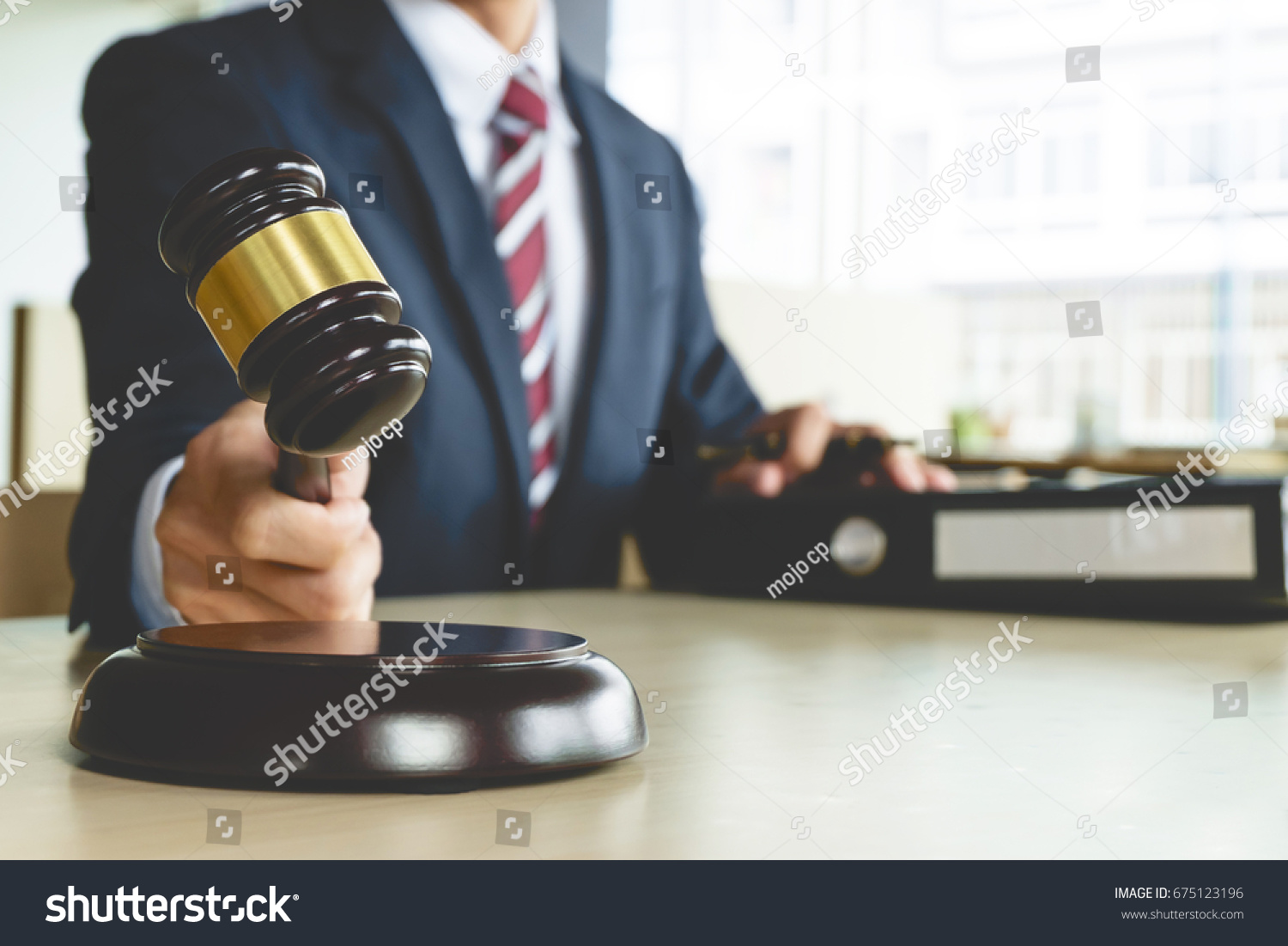 Justice and Law concept. lawyer working at courtroom, selective focus #675123196