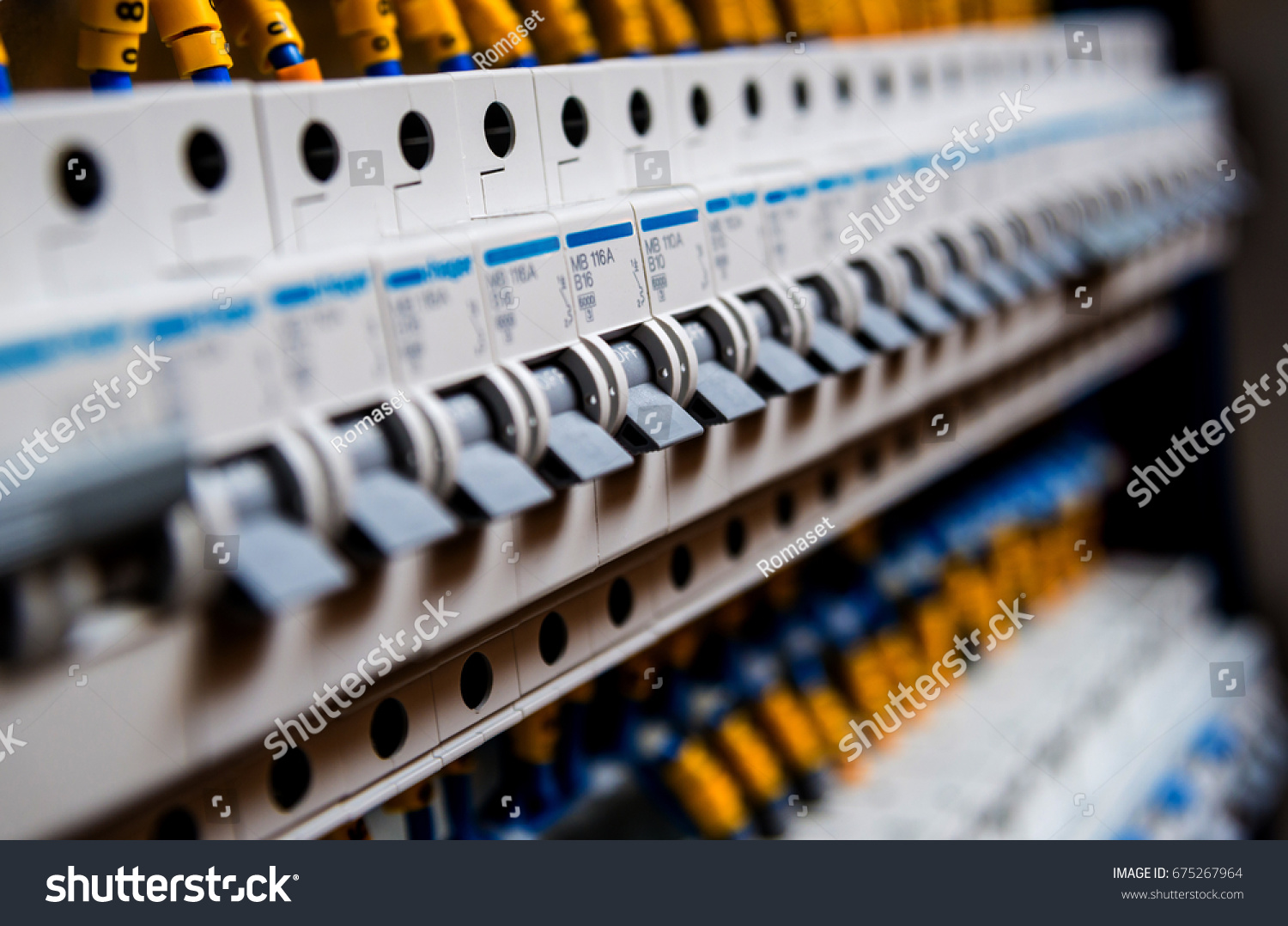 Voltage switchboard with circuit breakers. Electrical background #675267964