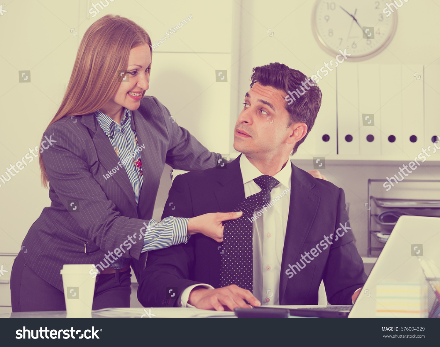 Sexual harassment between colleagues and flirting in office #676004329