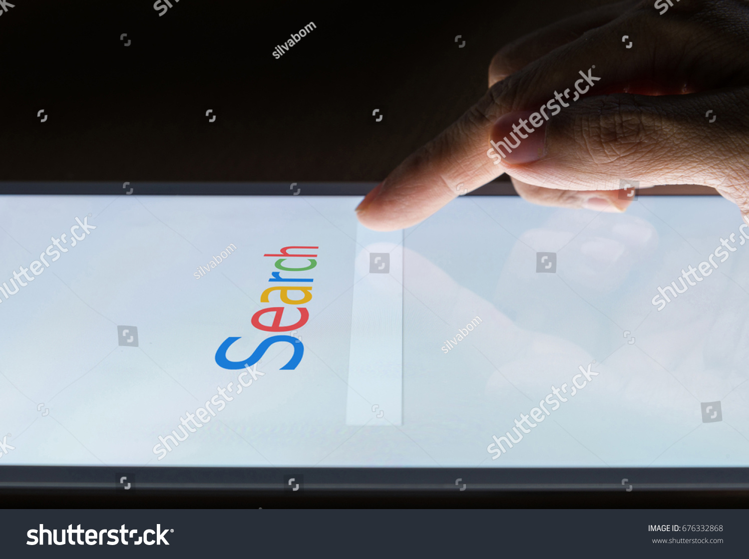 Search on internet search engine web on smart phone or tablet concept with night background #676332868