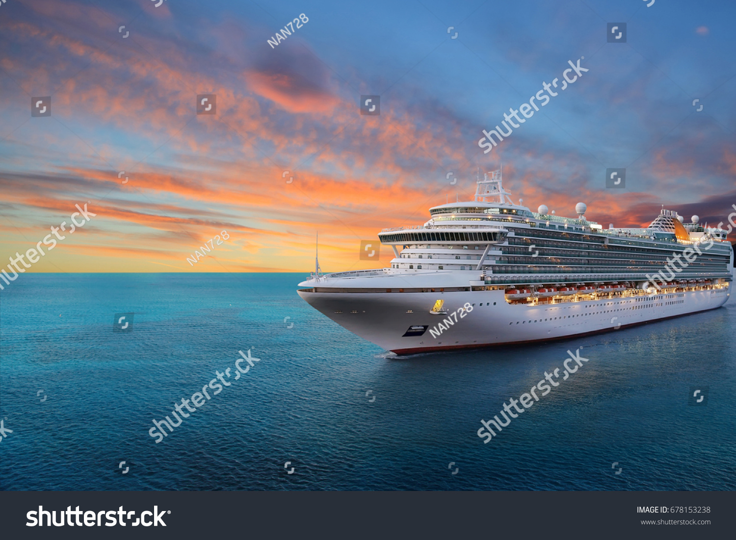 Luxury cruise ship sailing to port on sunrise  #678153238