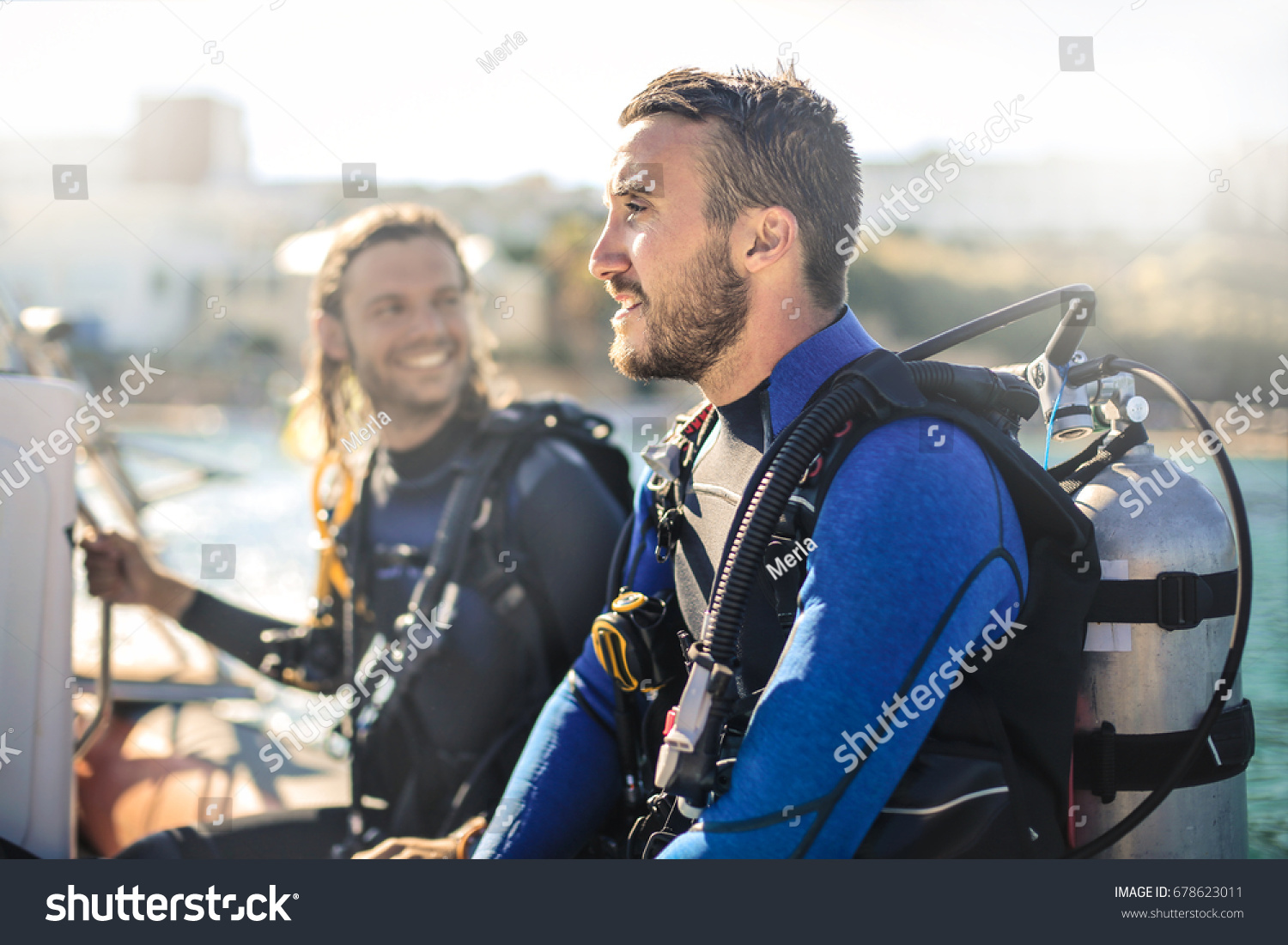 Scuba divers having fun #678623011