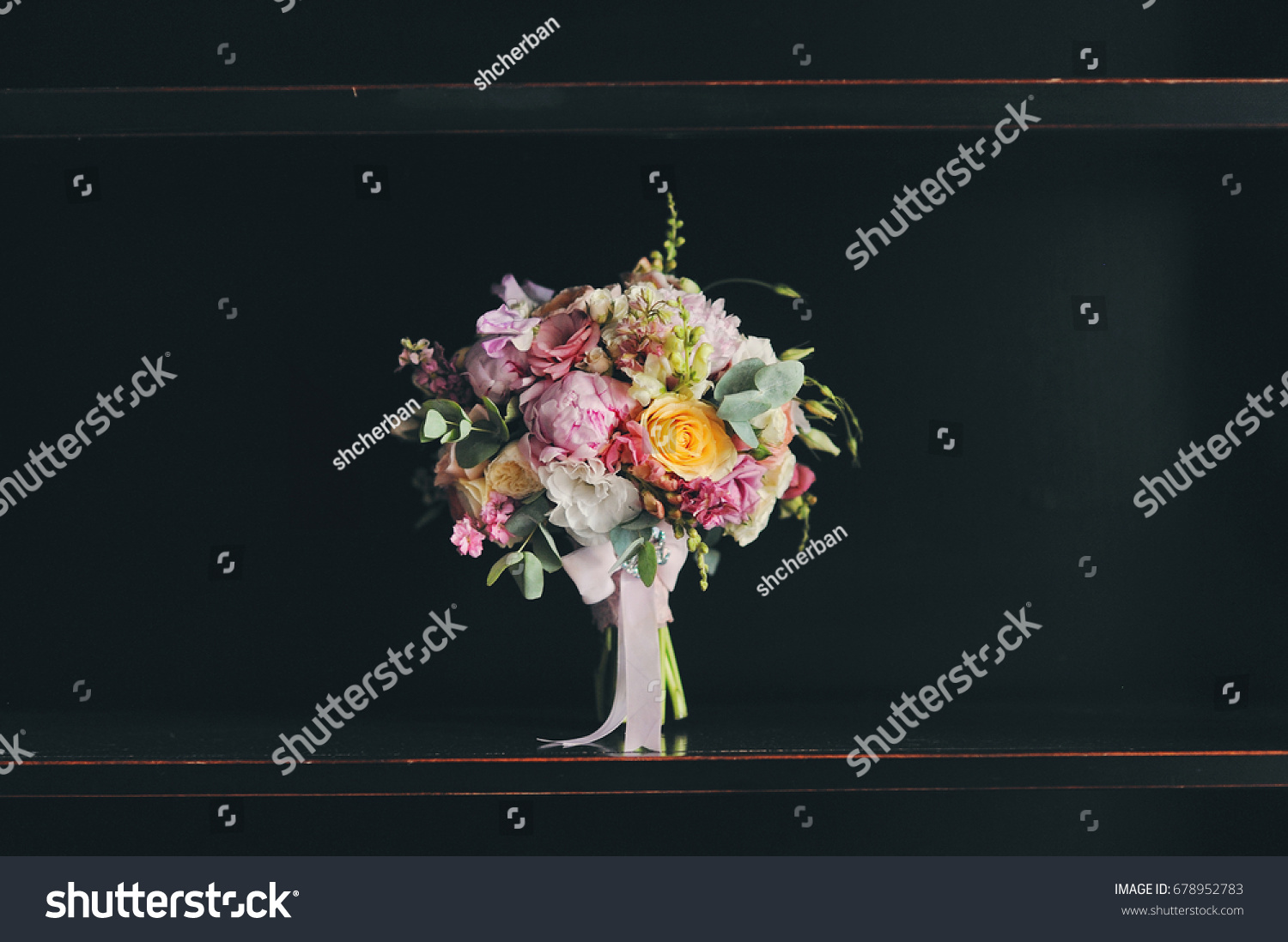 ?olor wedding bouquet against the black background. A color bouquet of the bride, love and romanticism, a gift on a shadow background #678952783