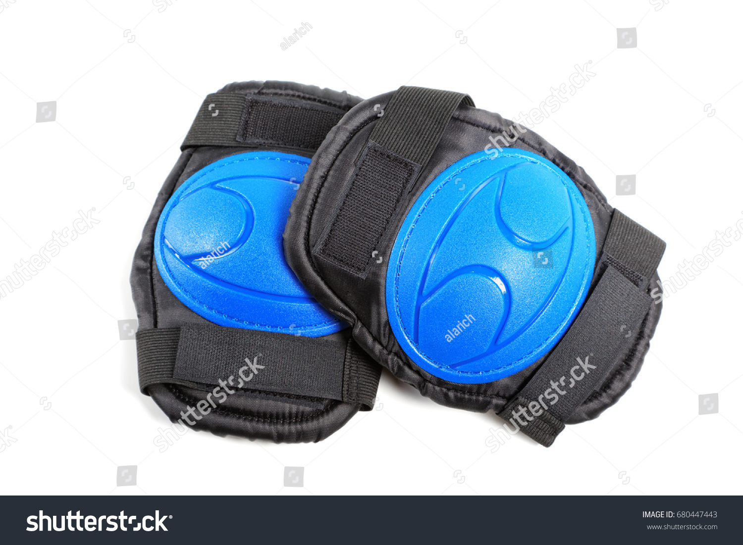 Knee pads and elbow pads isolated on white background #680447443
