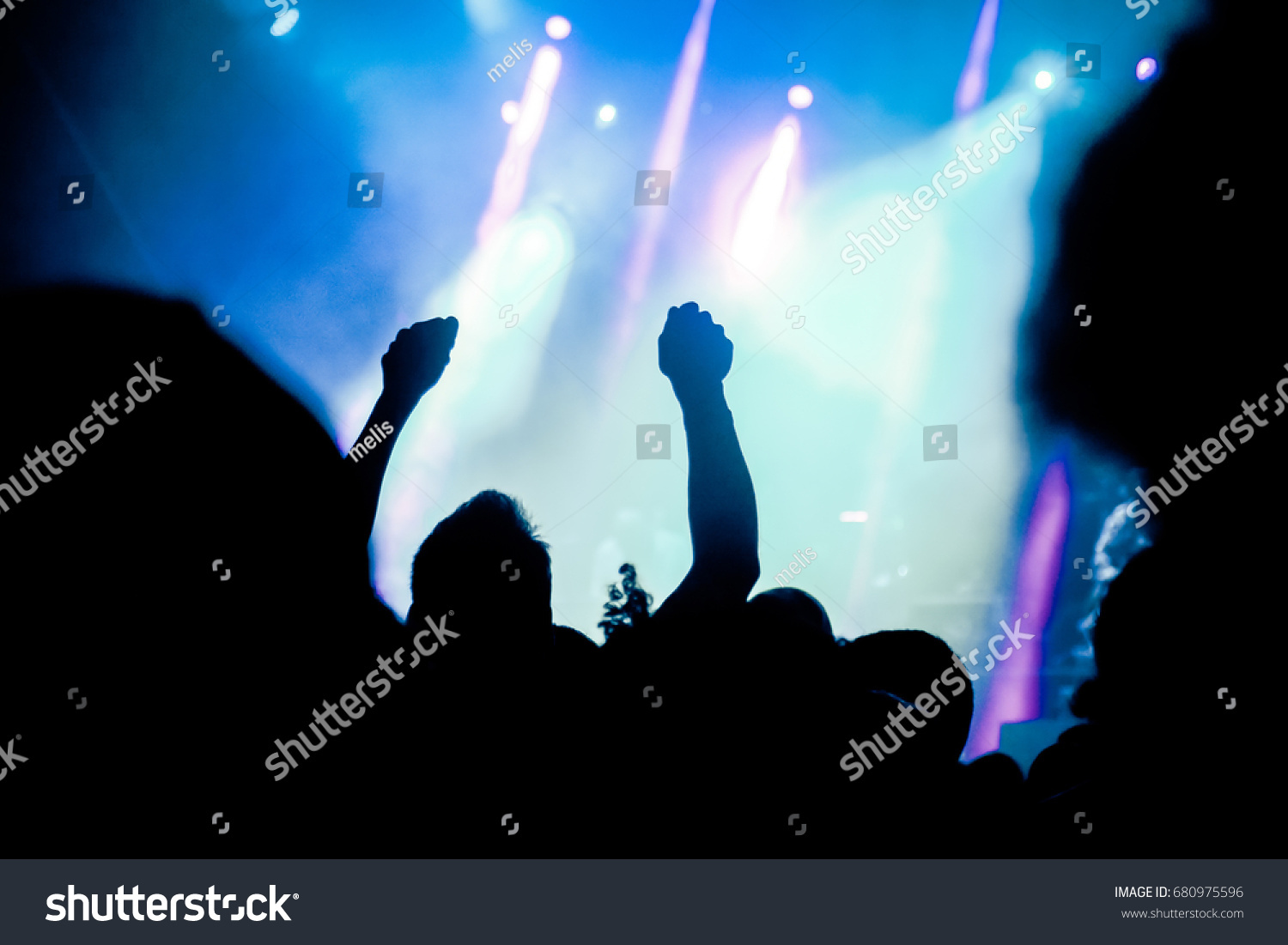 crowd with raised hands at concert - summer music festival #680975596