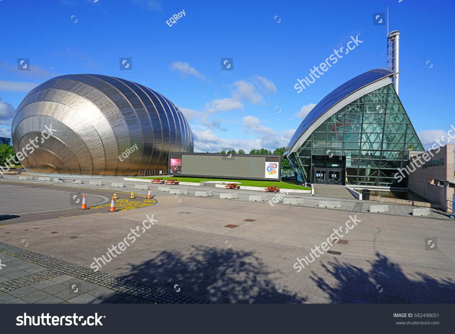 GLASGOW, SCOTLAND -11 JUL 2017- Exterior view of the Glasgow Science Centre, a complex of three modern titanium buildings located in the Clyde Waterfront Regeneration area in Glasgow, Scotland. #682498651