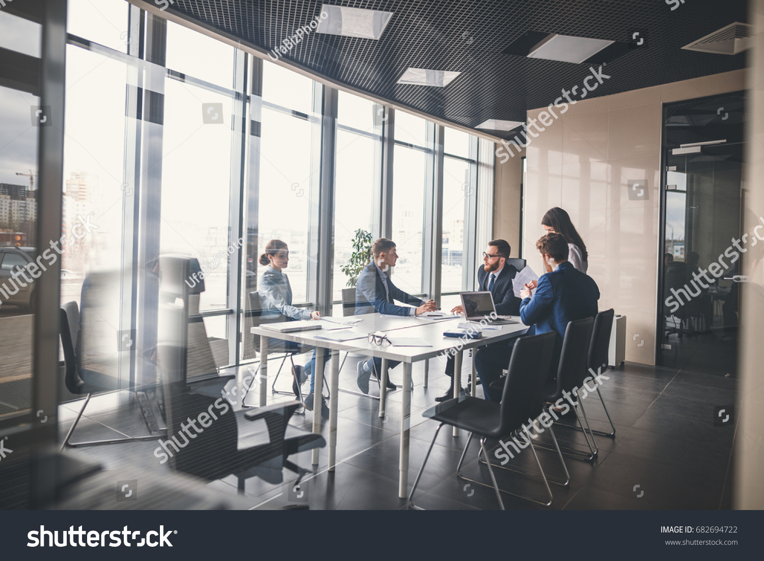 Corporate business team and manager in a meeting #682694722