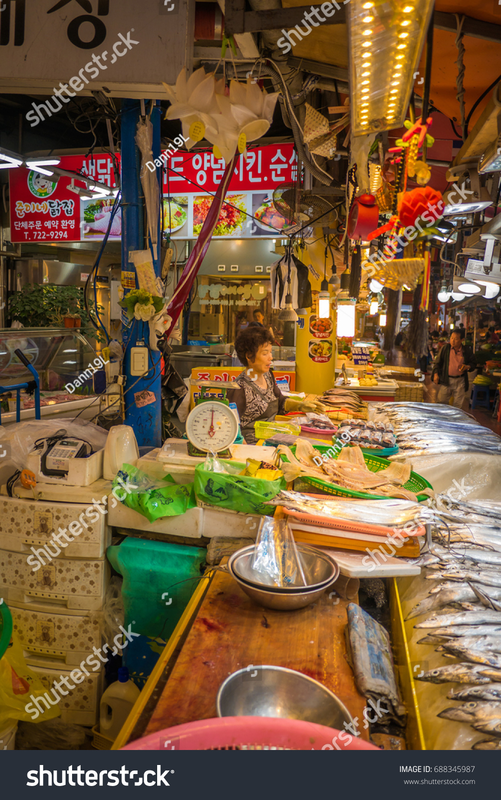 Jeju, South Korea - 29 September 2016: Jeju Dongmun Traditional Market. It has served countless customers in jeju with diverse items at inexpensive prices compared to regular marts or grocery stores. #688345987