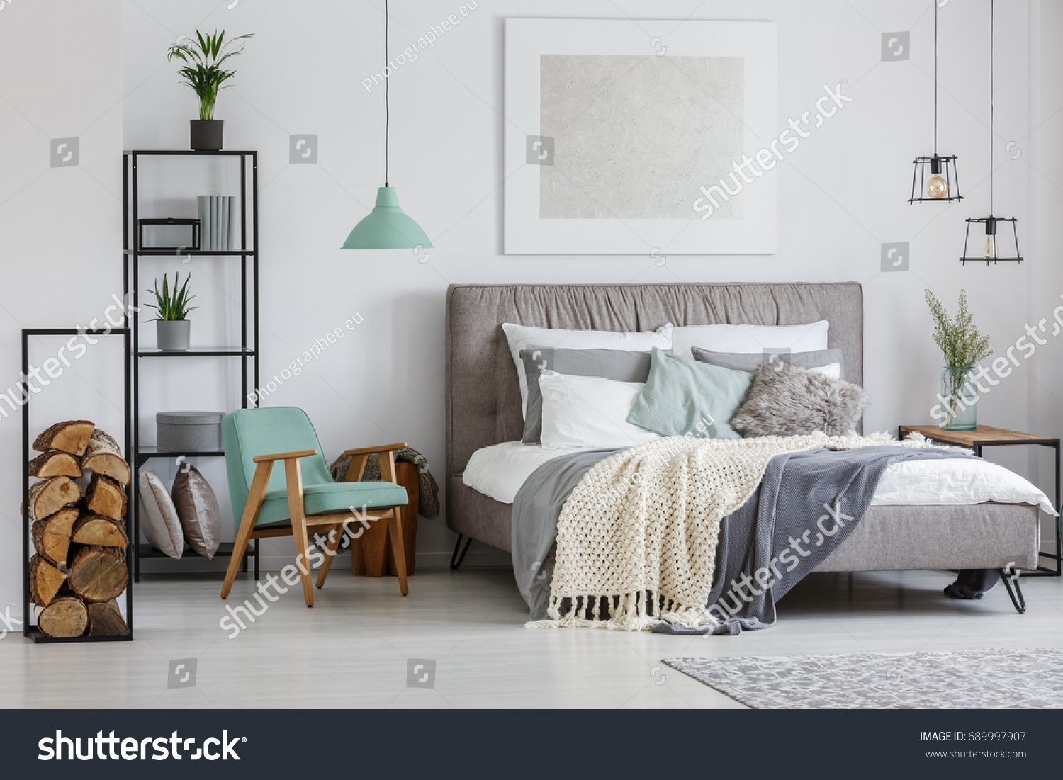 Cozy stylish hotel room with decorative wood pieces in metal frame #689997907