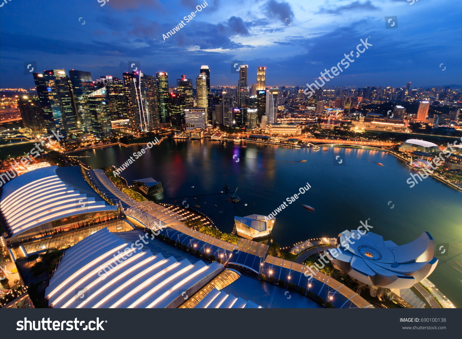 SINGAPORE - APRIL 14, 2017 : Singapore Marina Bay downtown night view from observation deck level 57 of Marina Bay sands hotel  #690100138