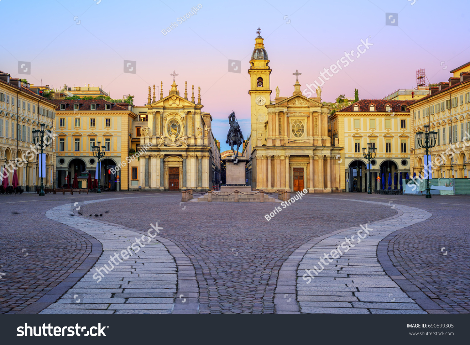 Piazza San Carlo square and twin churches of Santa Cristina and San Carlo Borromeo in the Old Town center of Turin, Italy, on sunrise #690599305