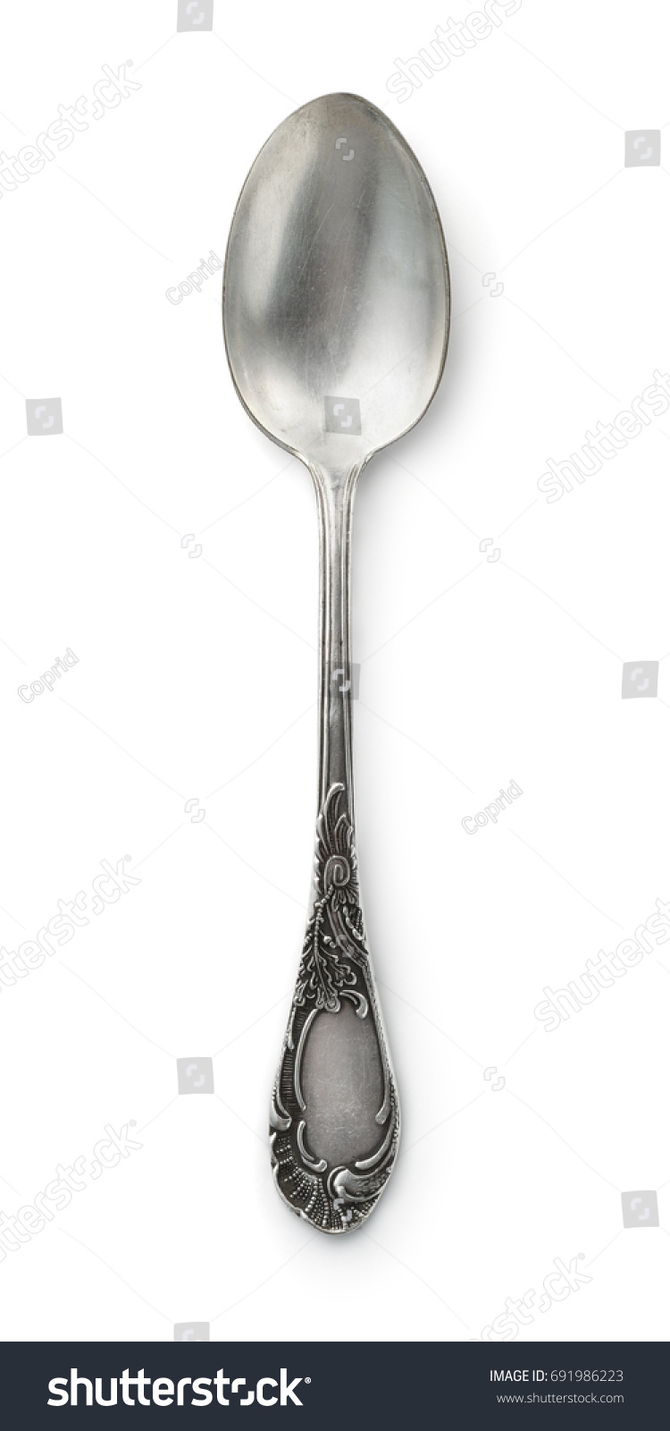 Top view of old silver tea spoon isolated on white #691986223