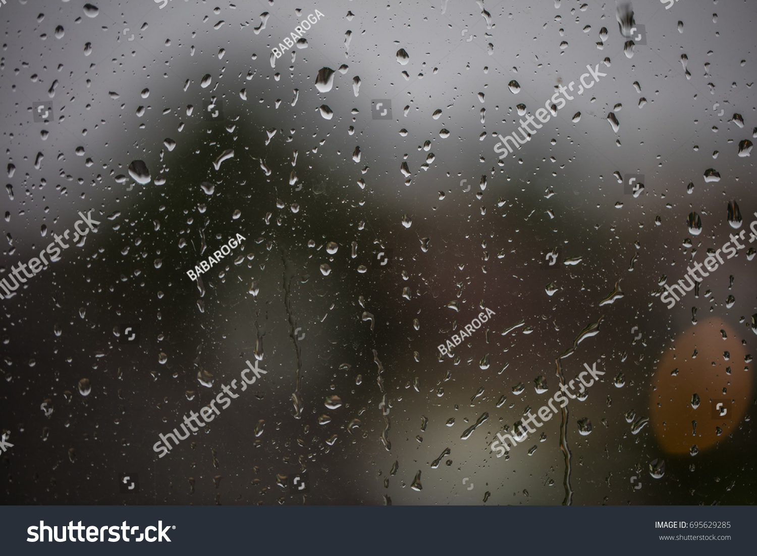 rainy days, rain drops on the window  #695629285