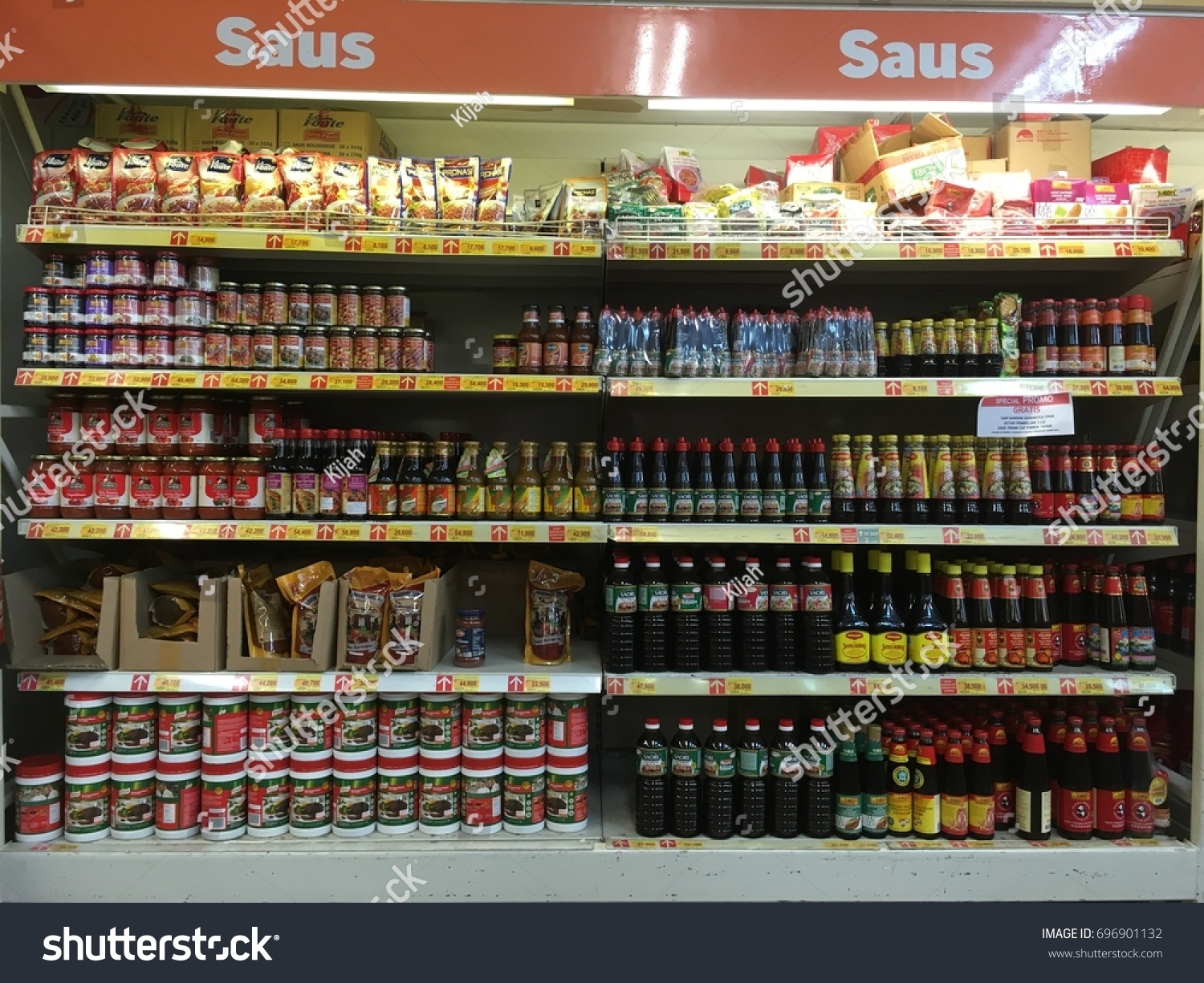 Wholesale at Jakarta, August 15, 2017. Sauce stock on the rack, lined and solid #696901132